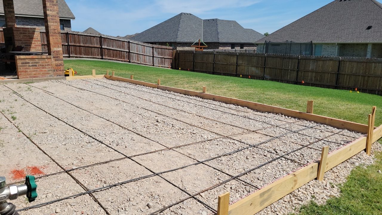 Concrete slab with Pergola by Clays Services Inc