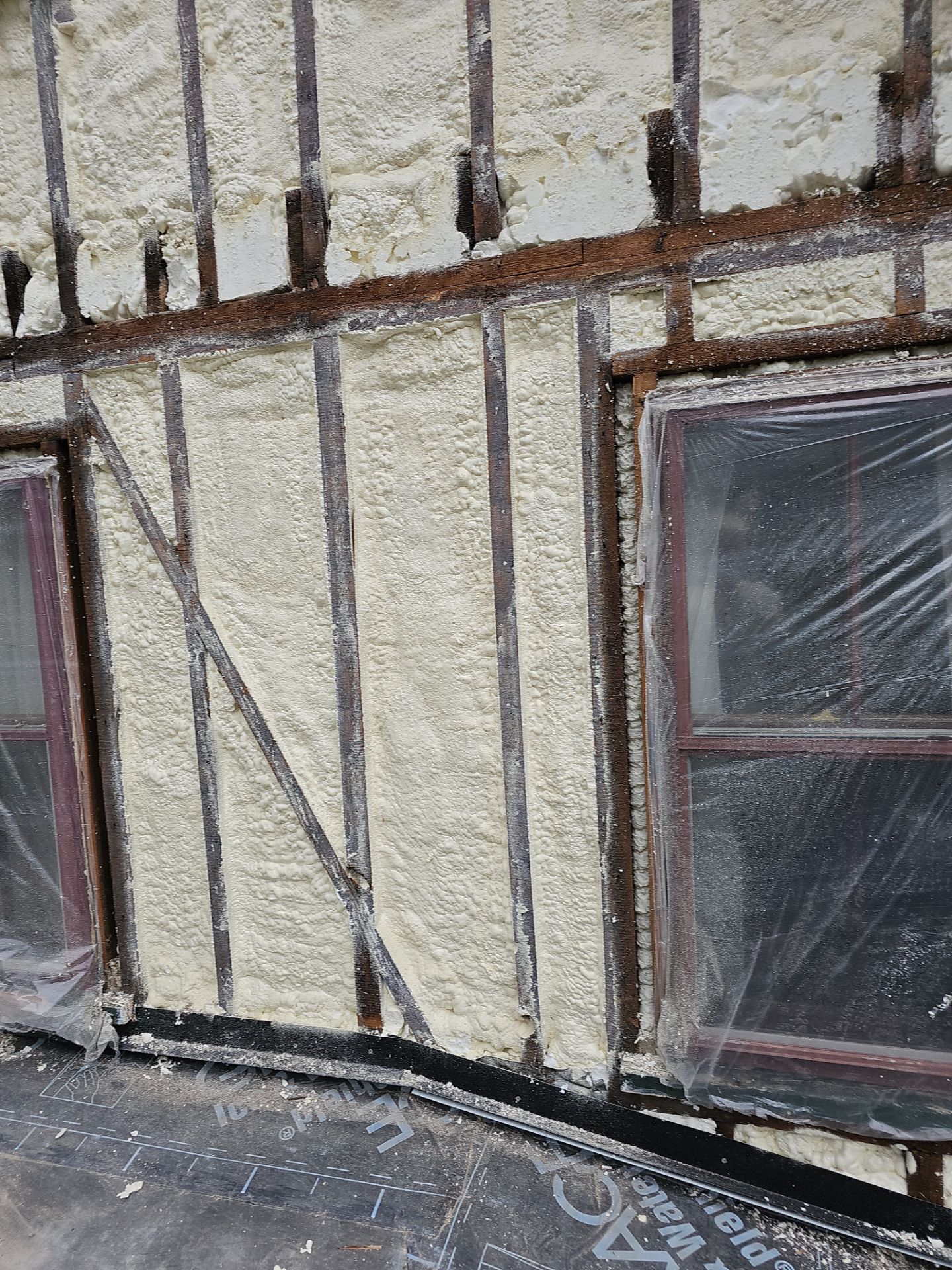 Siding Installation using Closed Cell Spray Foam by NYS Foam & Energy