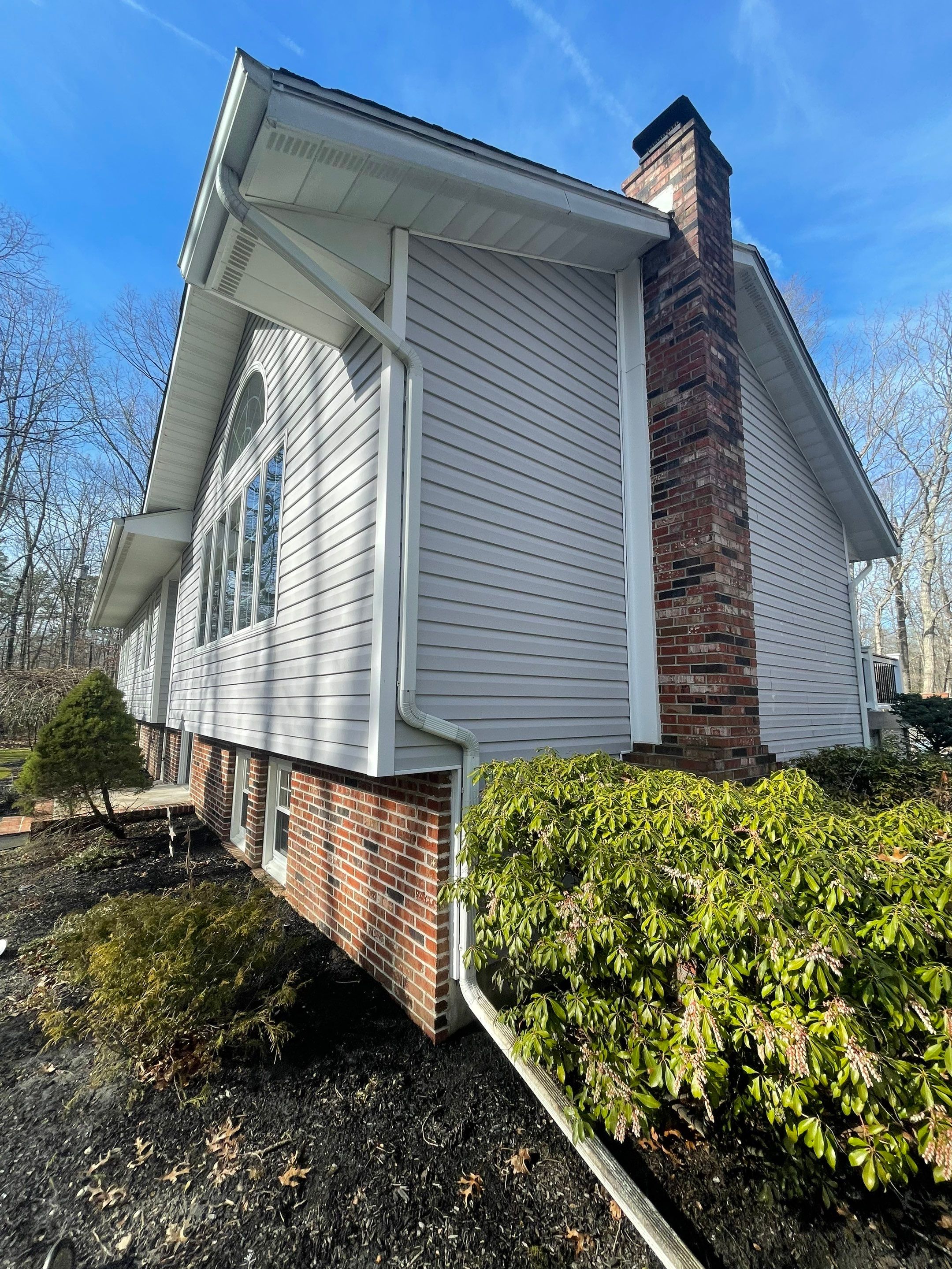 Pressure treated wood deck cleaned by SJ Exterior
