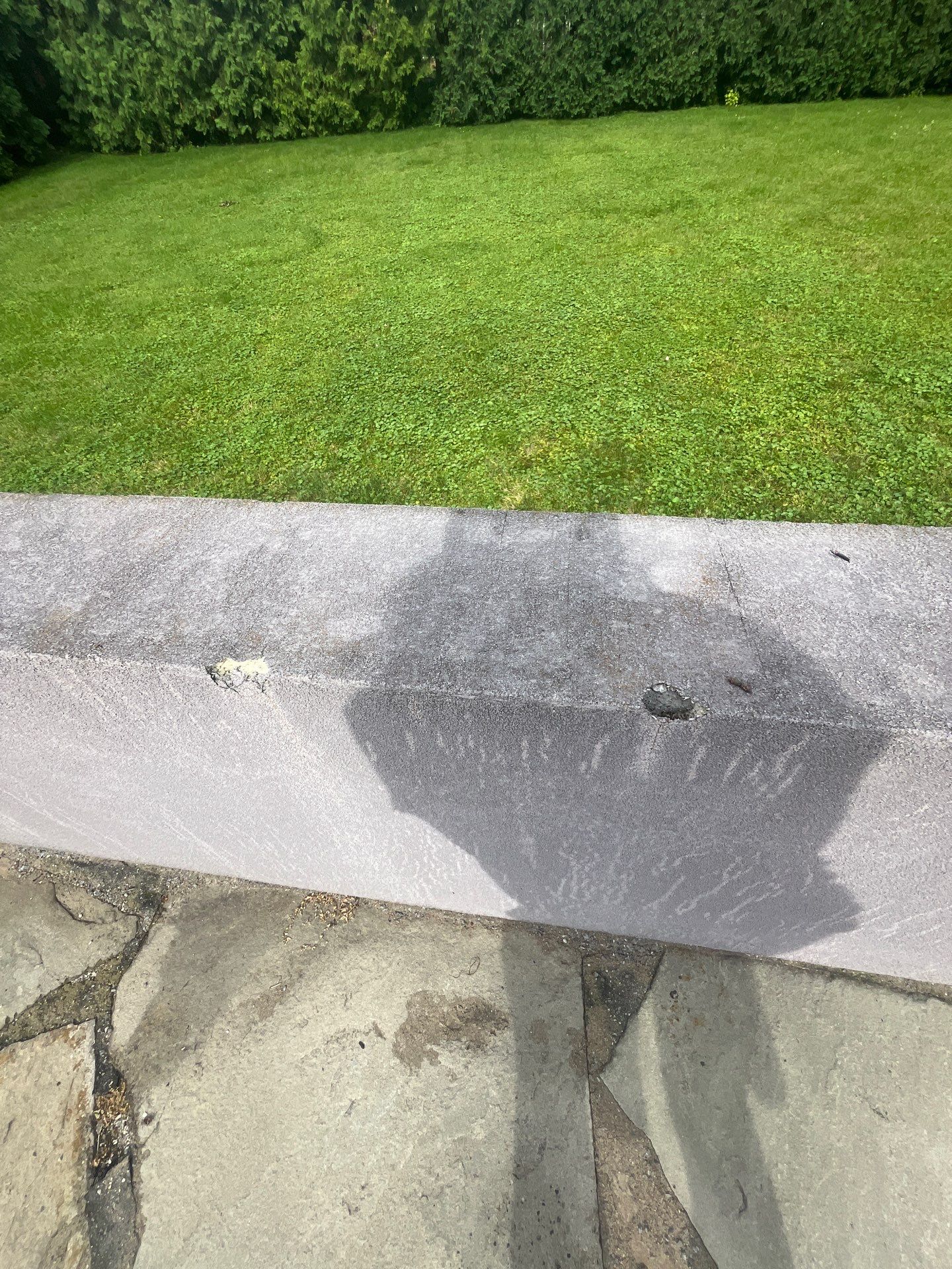 roof washing using Algaecide, soft wash soap by Northern Power Washing LLC.