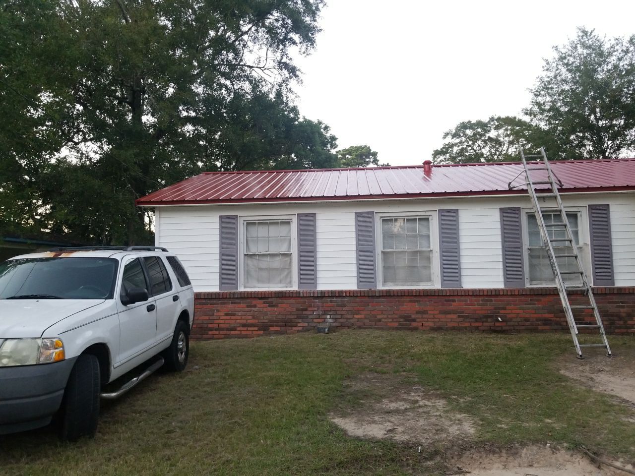 Residential Roofing Installation using Metal roofing by American Roofing & Construction LLC