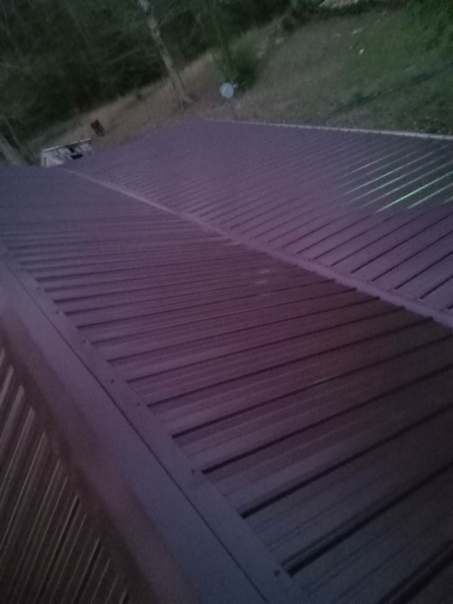Residential Roofing Installation using Aluminum Roofing panels by Hostetler Roofing