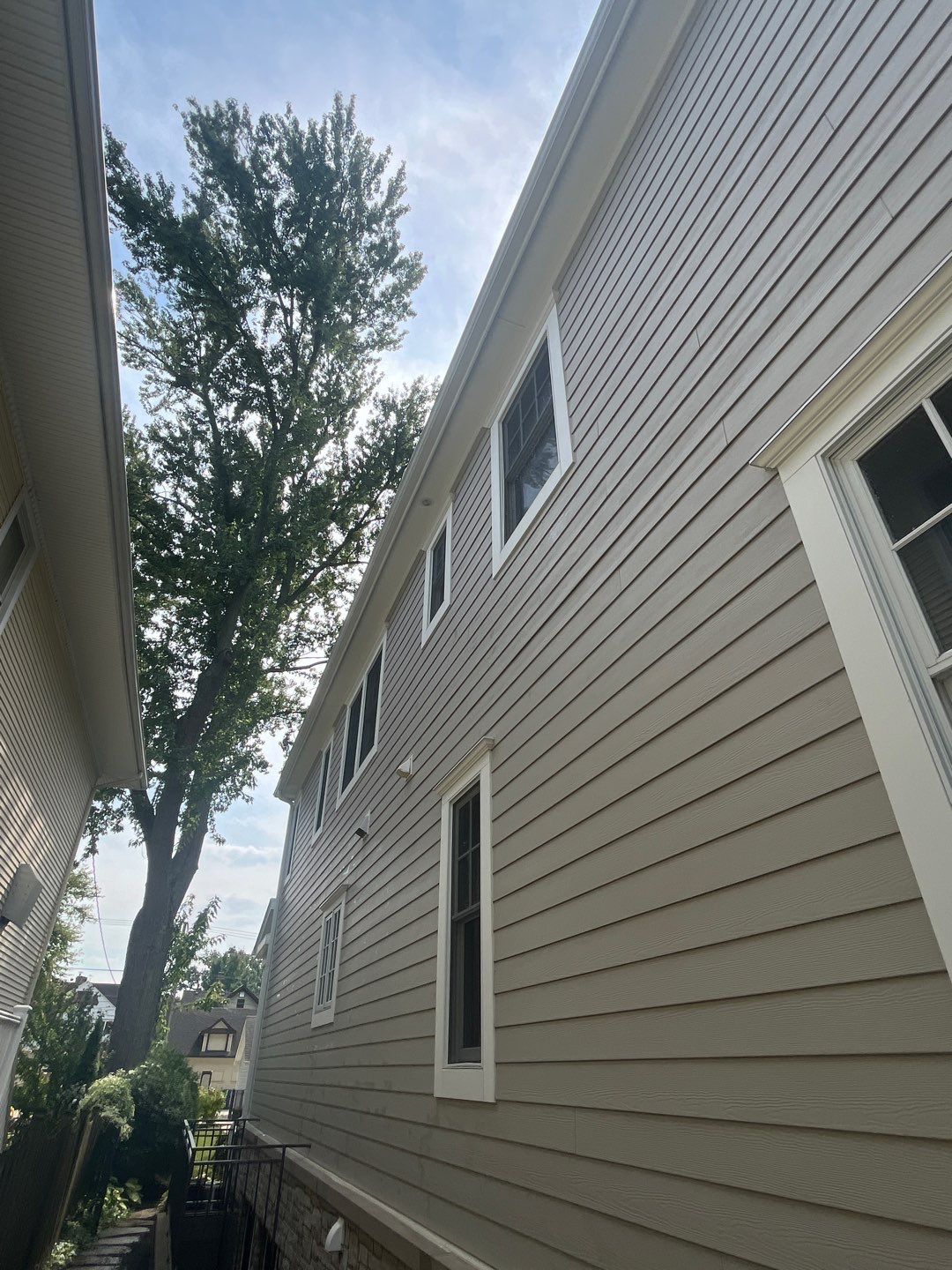 Hardie Board House & Detached Garage Soft Washing by Northern Power Washing LLC.
