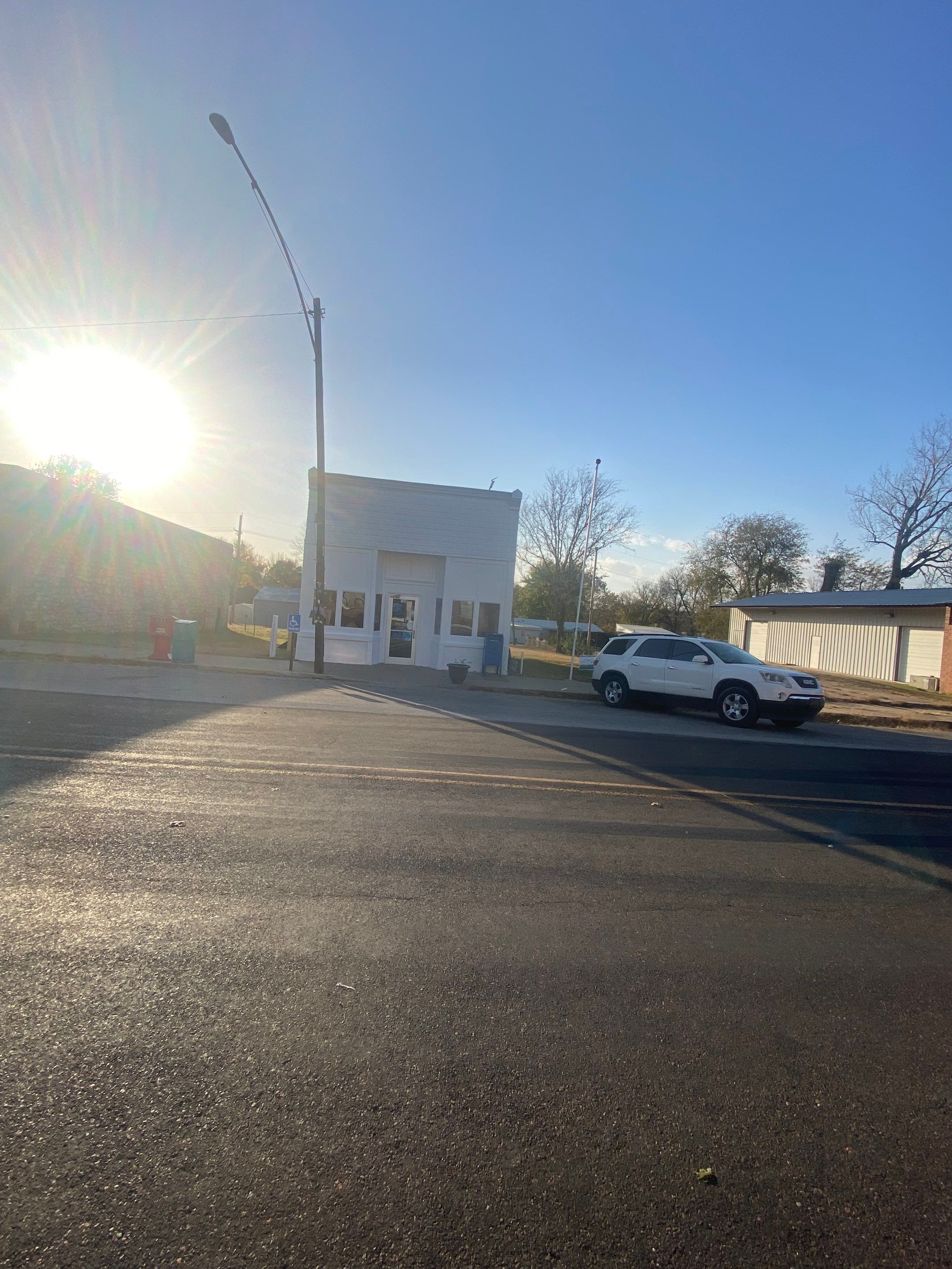 Historic Revival: Restoring a Downtown Post Office with Fresh Paint and Expert Wood Rot Repair by Cougar Painting