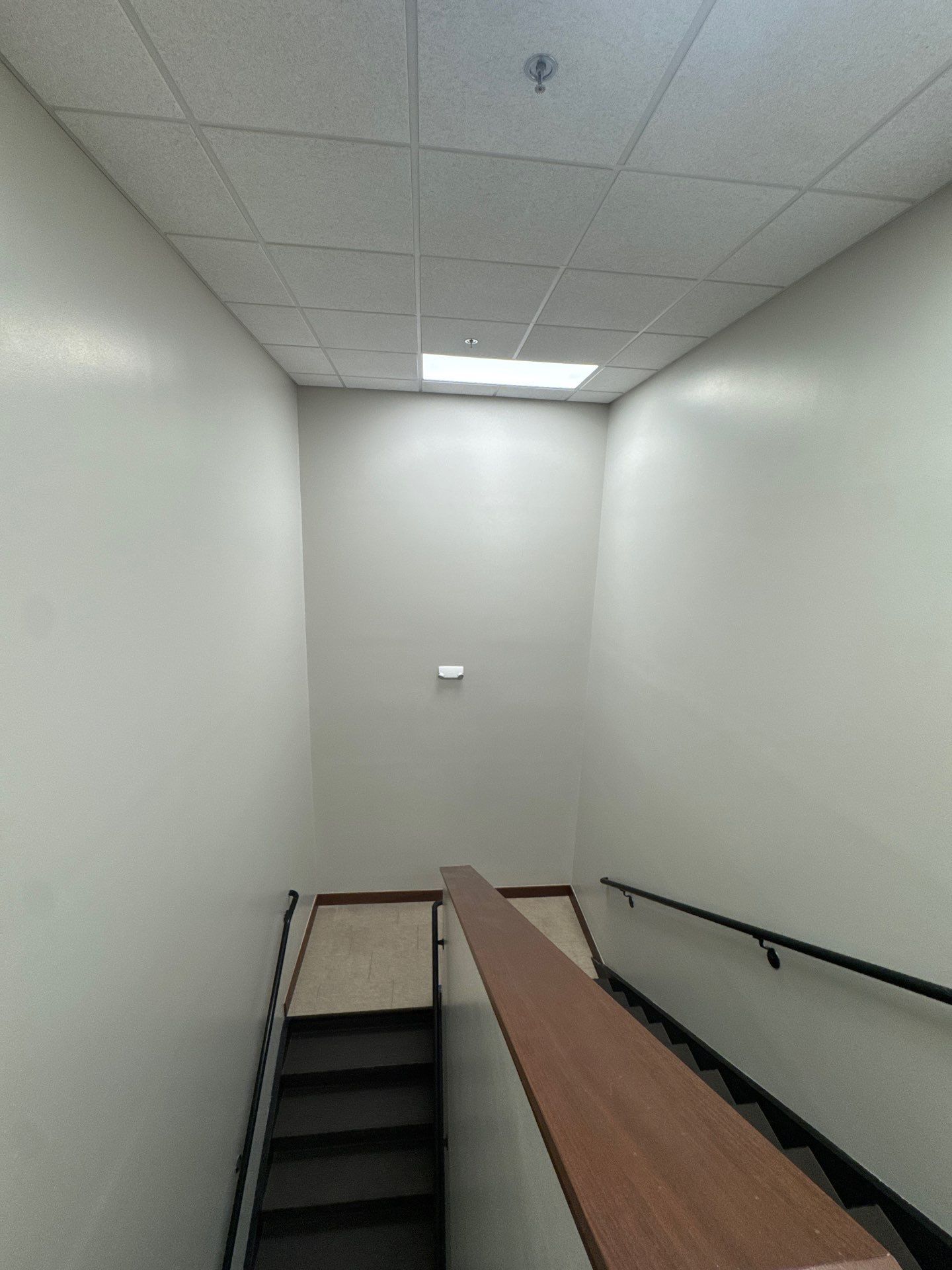 Commercial Office Interior Remodel and Modern Suite Refresh in Sioux Falls by Select Painting, Coatings & Garage Cabinets
