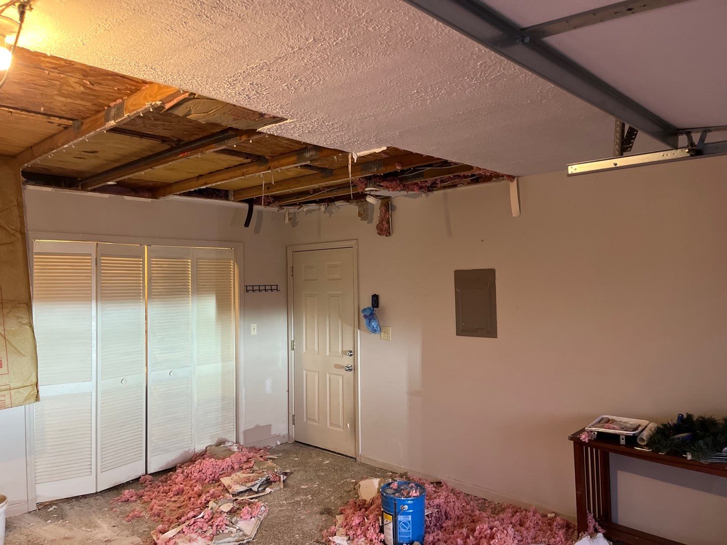 Interior Water Damage Affecting the Garage and Kitchen  by ANR Restoration