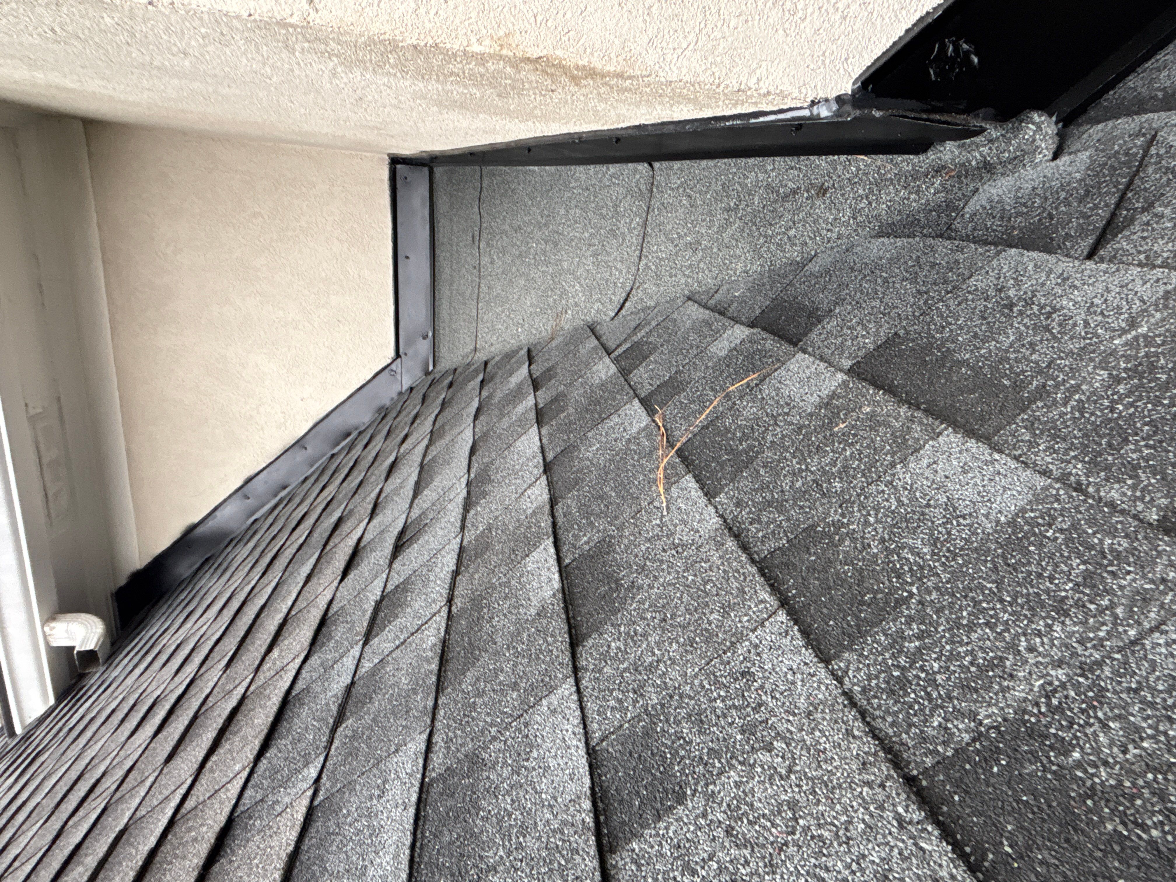 Wrong V valley section installed by Deerfield Roofing LLC