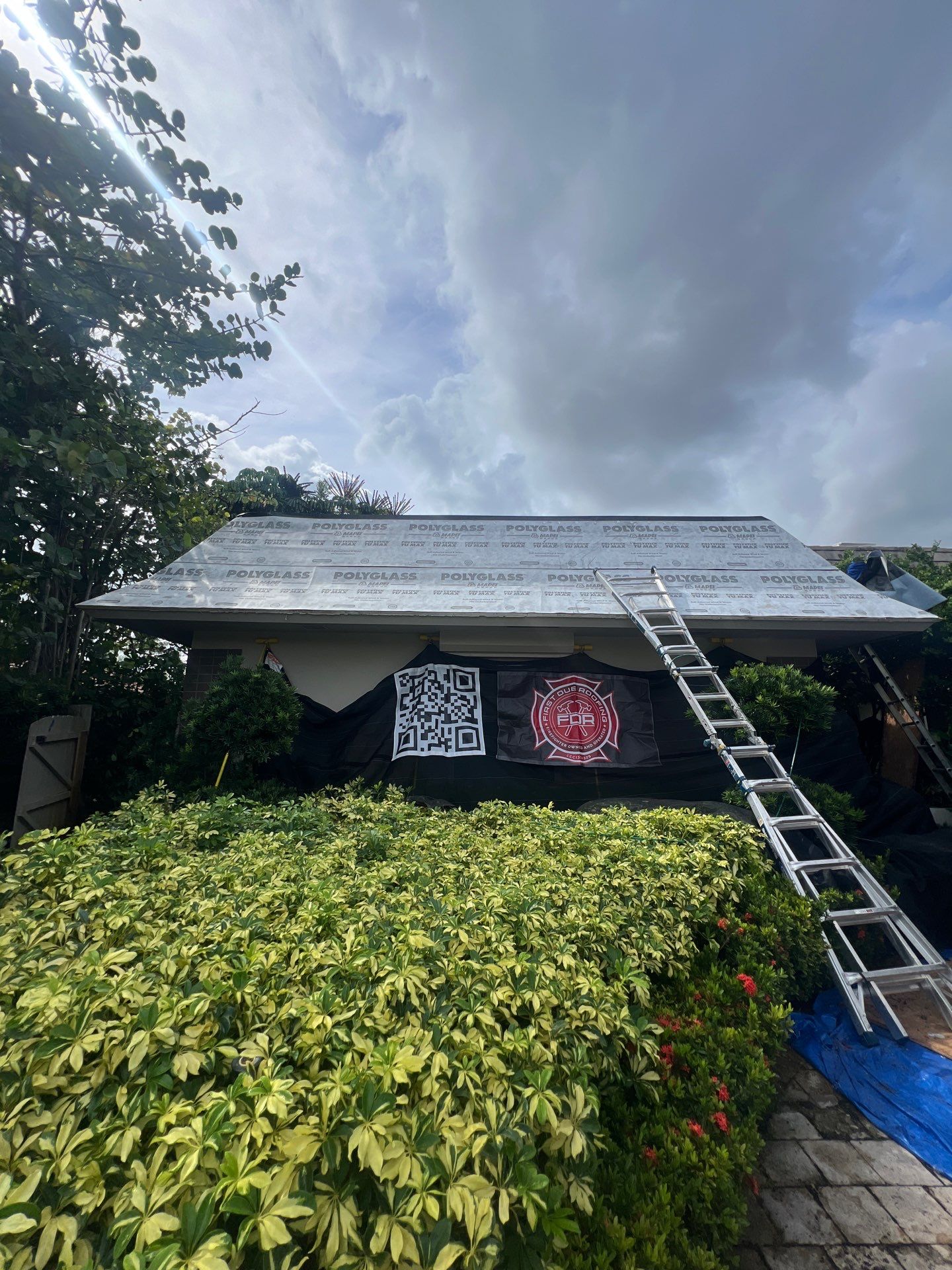 Amazing TPO flat deck re-roof with Eagle mansard in Hollywood Florida.  by First Due Roofing