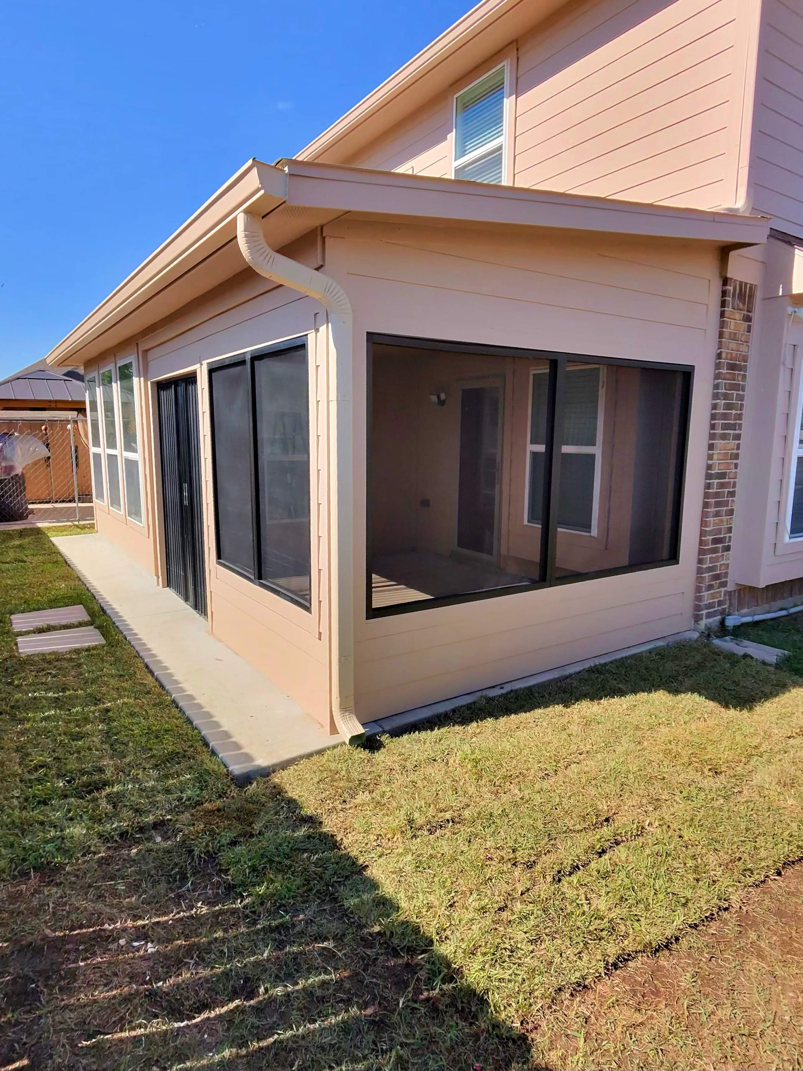 Project Case Review: Sunroom Addition, Patio Integration & Drainage Upgrade by Texas Urban Elements