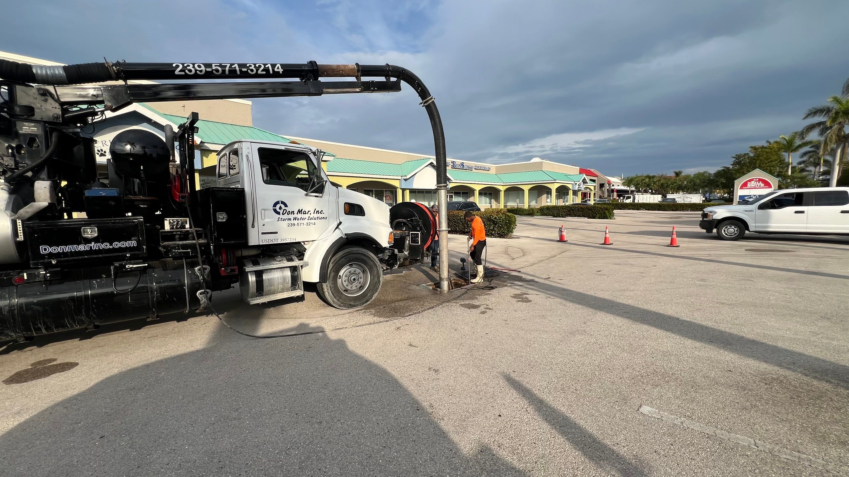 Stromwater System Maintenance at Bill Smith Appliances / Critter Cafe Marco Island Catch Basin by Don Mar, Inc. Storm Water Solutions