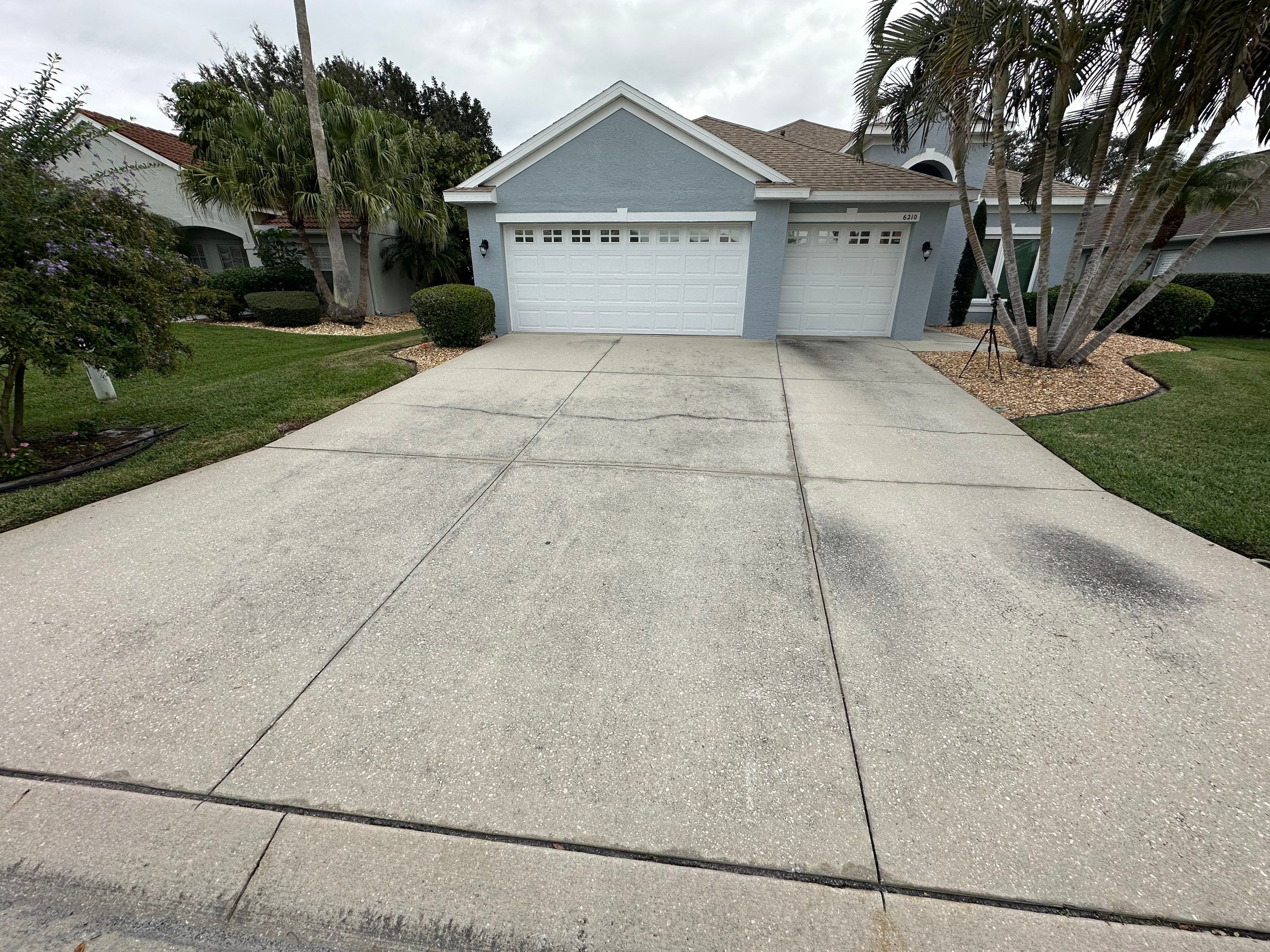 Concrete Driveway, Entryway & Street Curbing Cleaning in Fairways at Imperial Lakes, Palmetto, FL | Sunshine AquaWash by Sunshine AquaWash