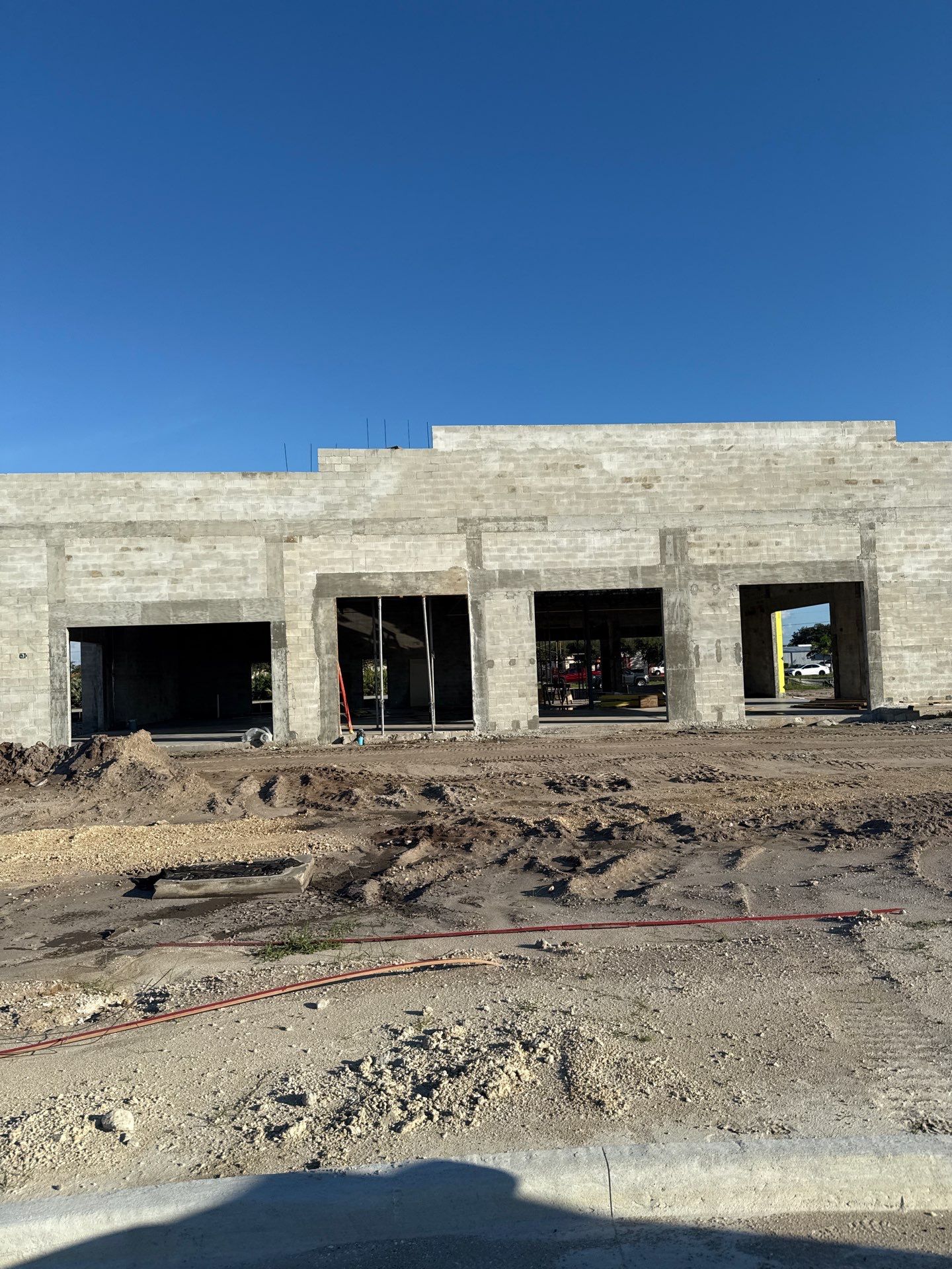 Downspout Installation using collector head in Cape Coral FL by Gutter Professors