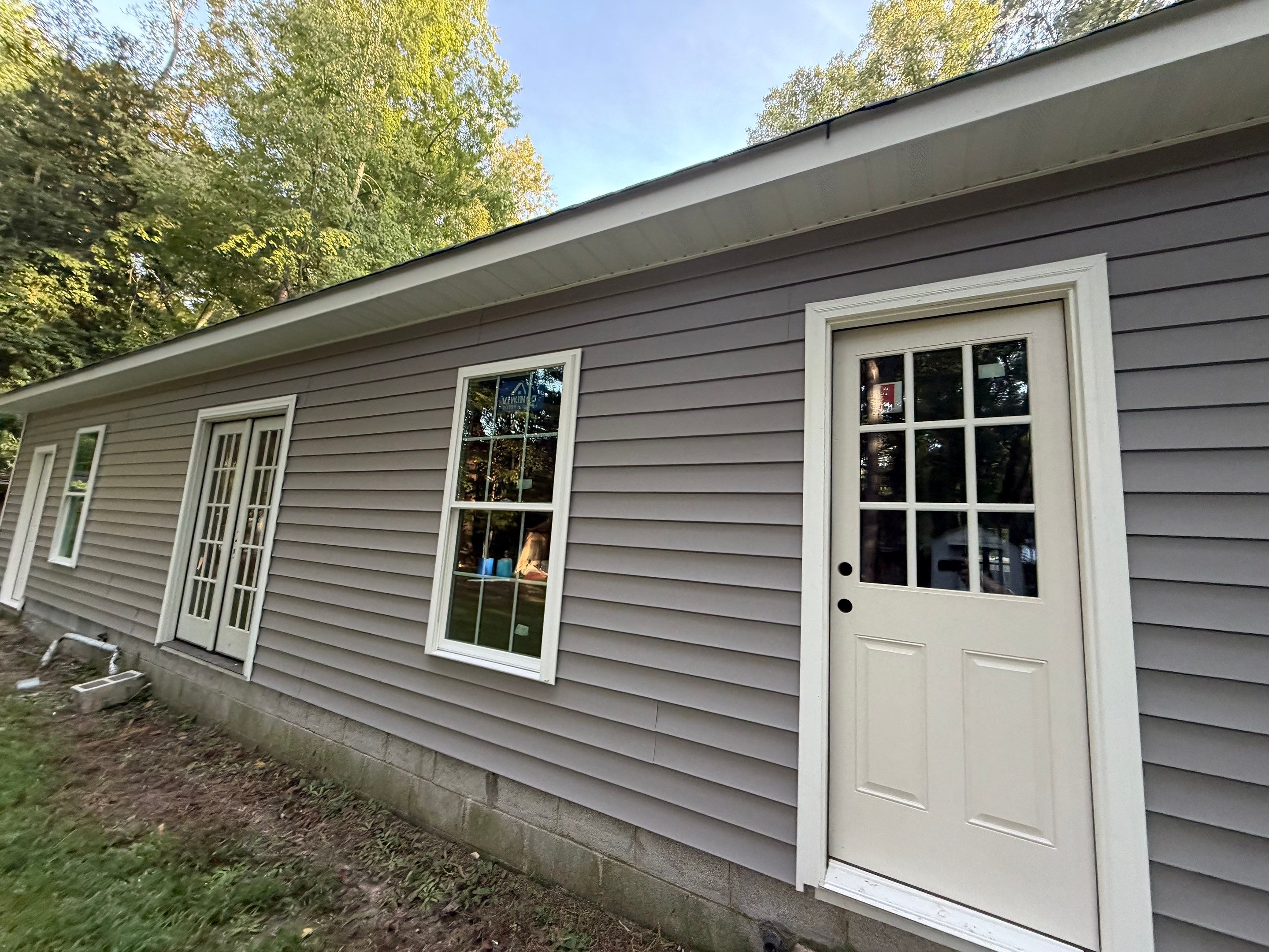 Single-Story New Construction Vinyl Siding Install in Gloucester by Cade Construction