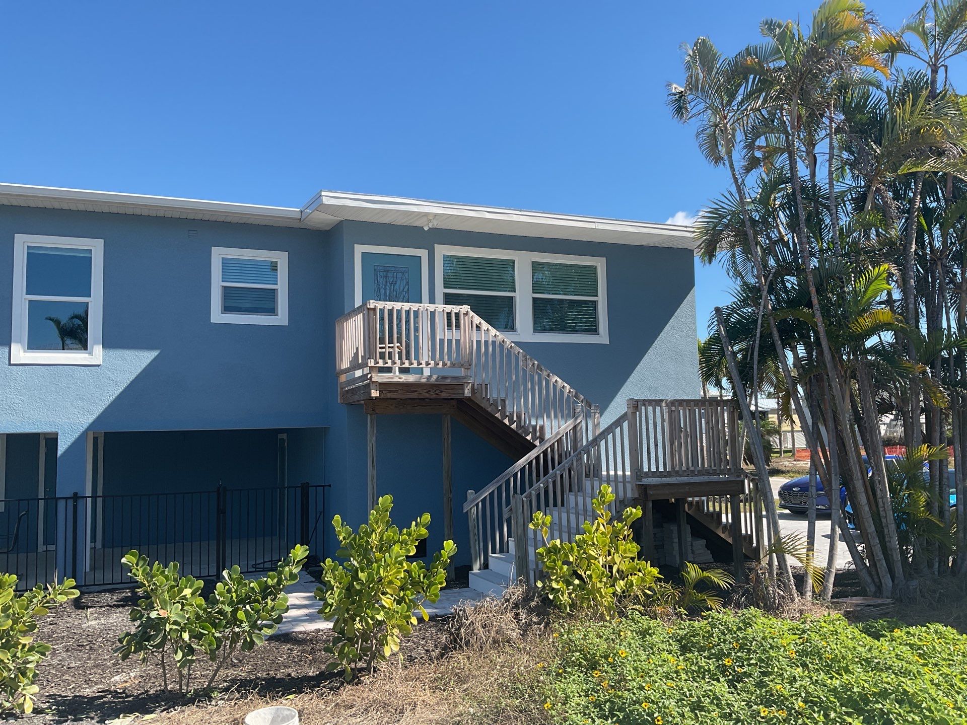 Downspout Installation for Two-Story Home in Fort Myers FL by Gutter Professor by Gutter Professors