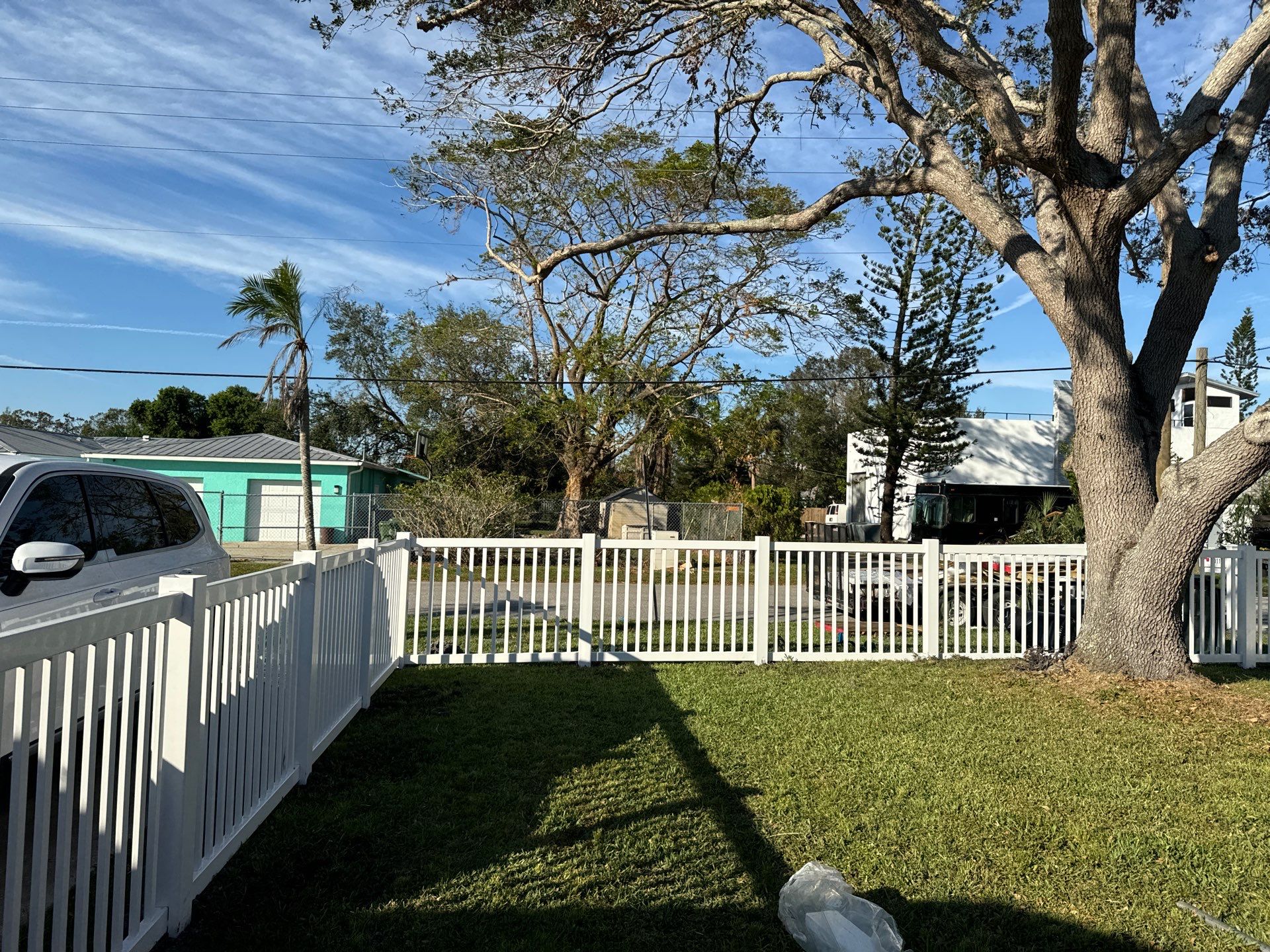 Vinyl Fence Installation using 6Ft White Vinyl Privacy Fence and a 4Ft White Vinyl Picket Fence by Asap fence and gates, LLC