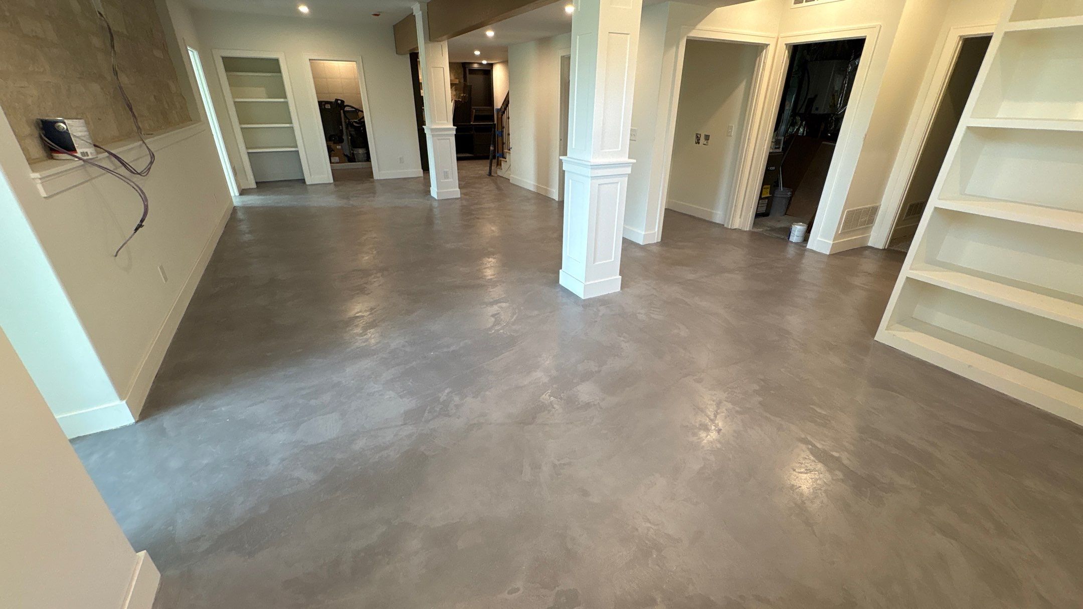 Basement Floor Overlay - Lawrence, KS by Big Red Decorative Concrete, LLC