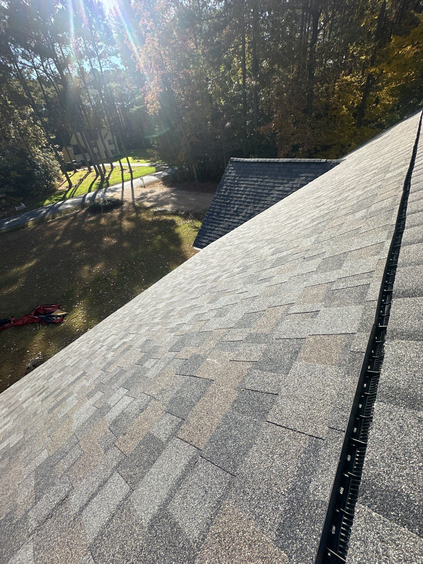 Mathews Residential Roof Replacement Using Owens Corning Duration Shingles by Cade Construction