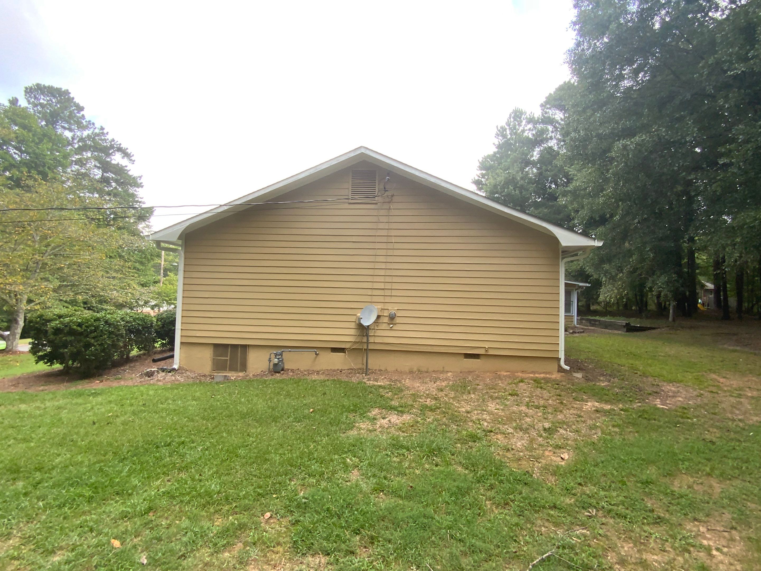 Full Exterior House Painting and Siding Repair in Acworth by Swift Home Renovations