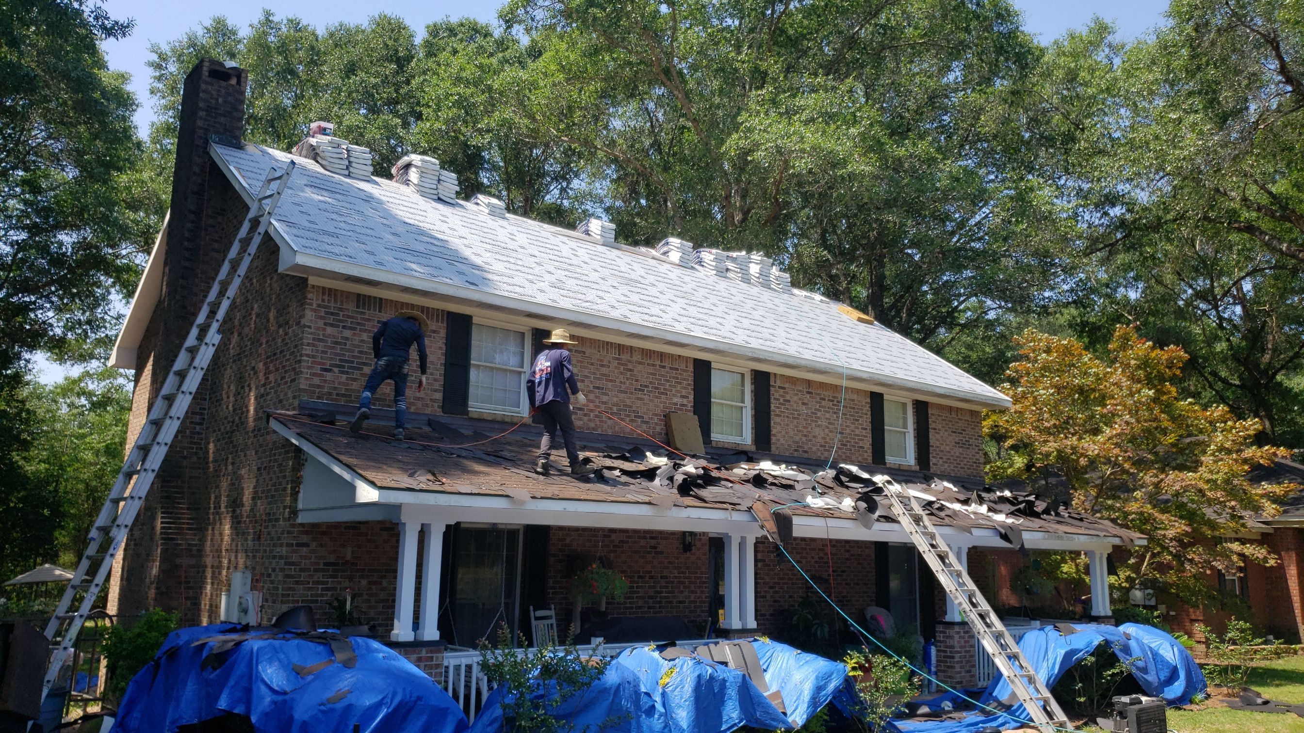 Residential Roofing Installation using Roof Replacement by American Roofing & Construction LLC