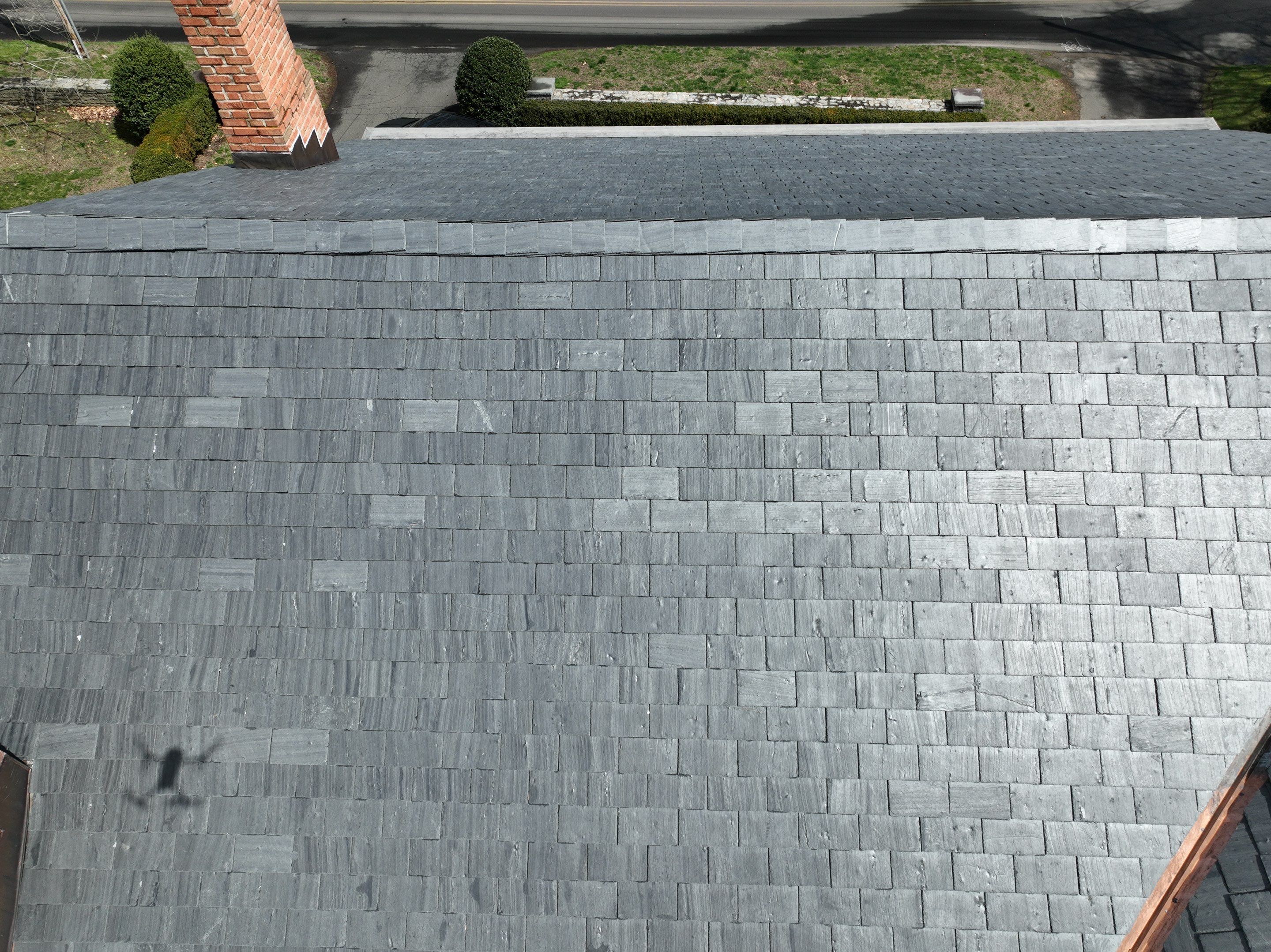 Residential Roofing Installation using Vermont Slate by A Plus Exterior