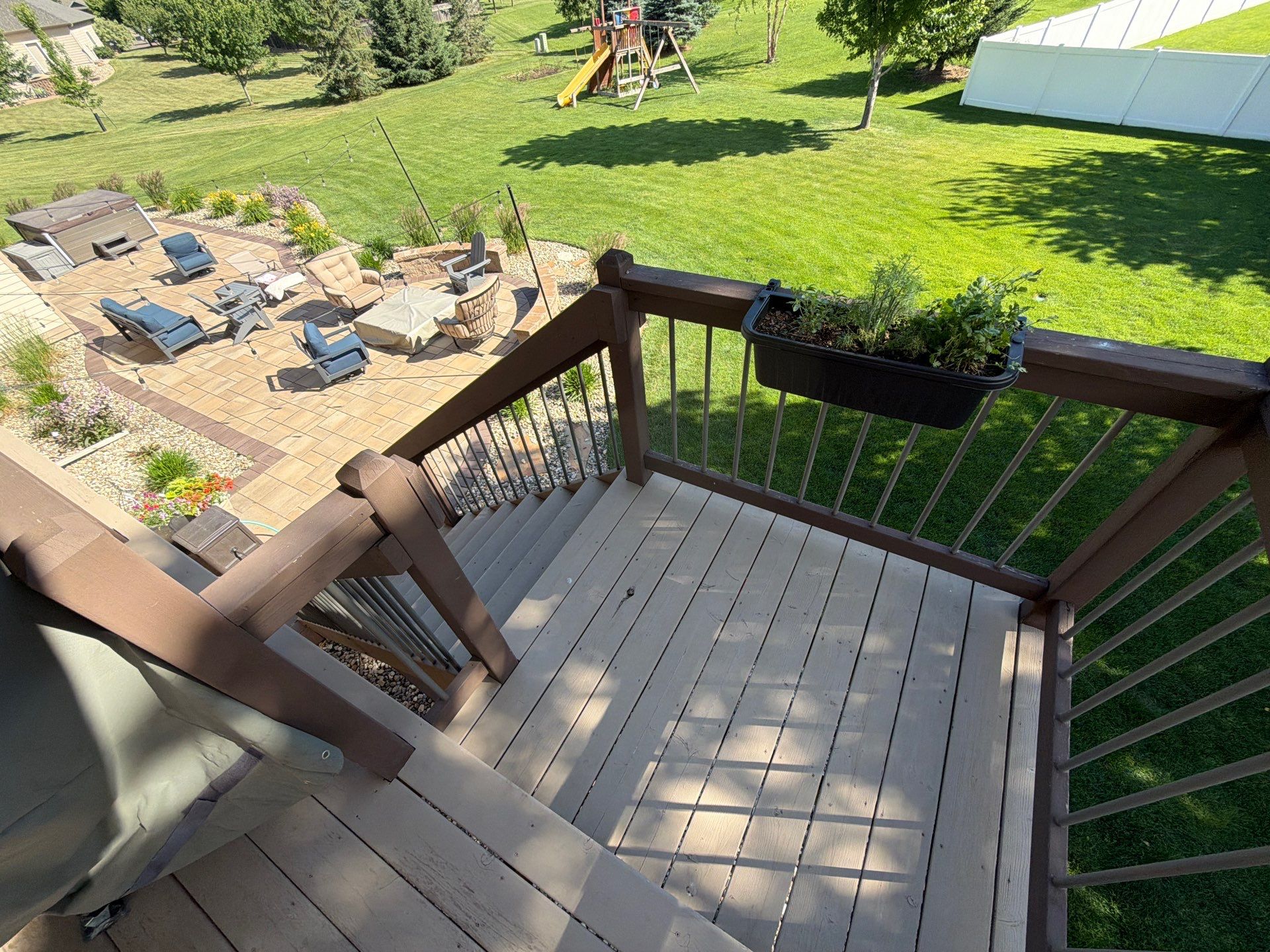 Sioux Falls Exterior Refresh and Multi-Level Deck Maintenance by Select Painting, Coatings & Garage Cabinets