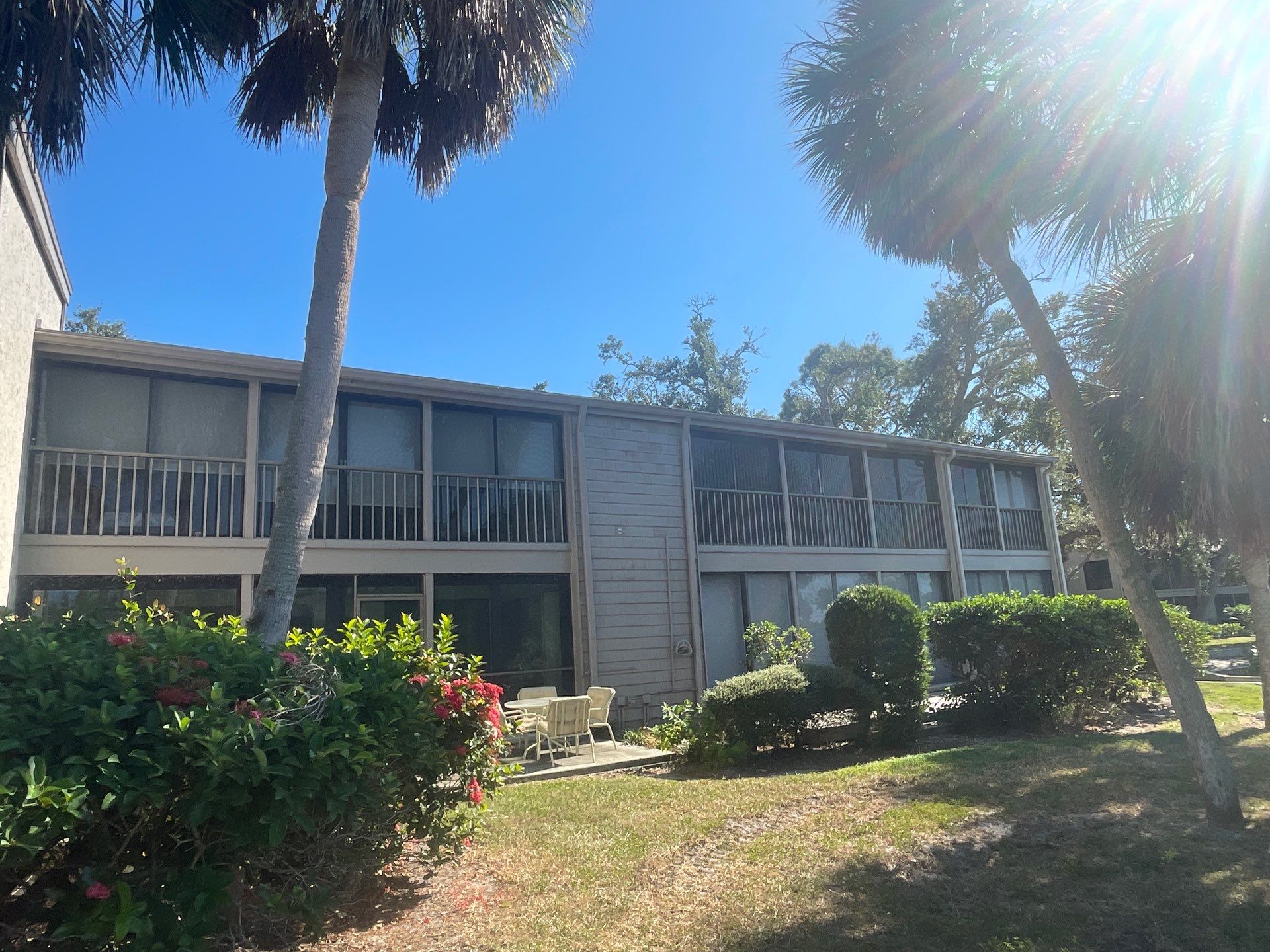 White Gutters Repair and Installation in Sarasota FL by Gutter Professors