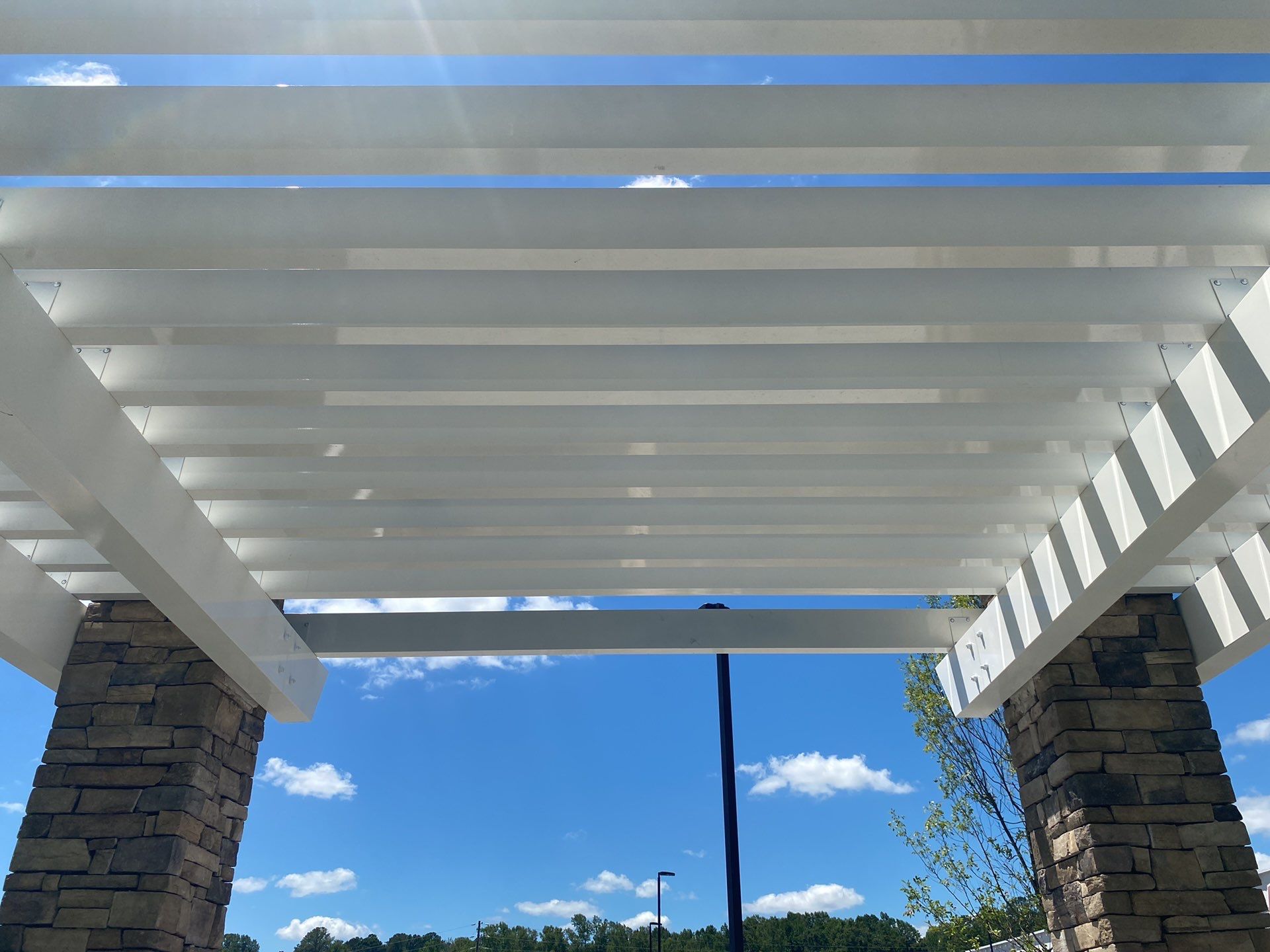 Commercial Roofing Installation using Berridge 11 1/2" Cee Lock .032 Aluminum Charcoal Grey by Infinity Metal Systems