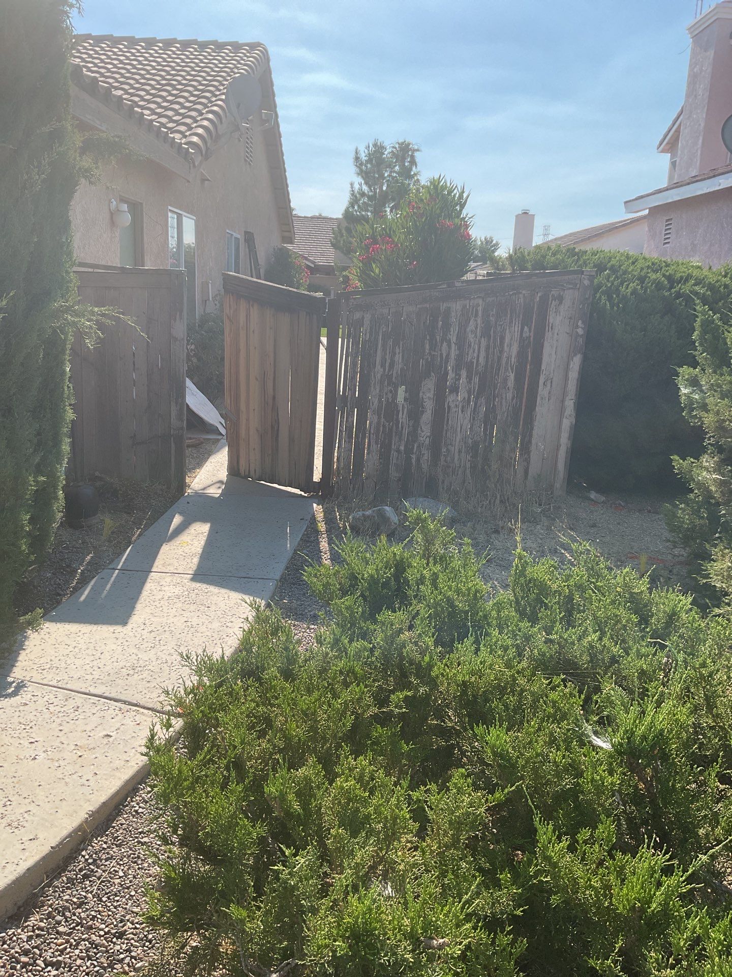 Gate installation using Vinyl by Fence Guys Inc. 