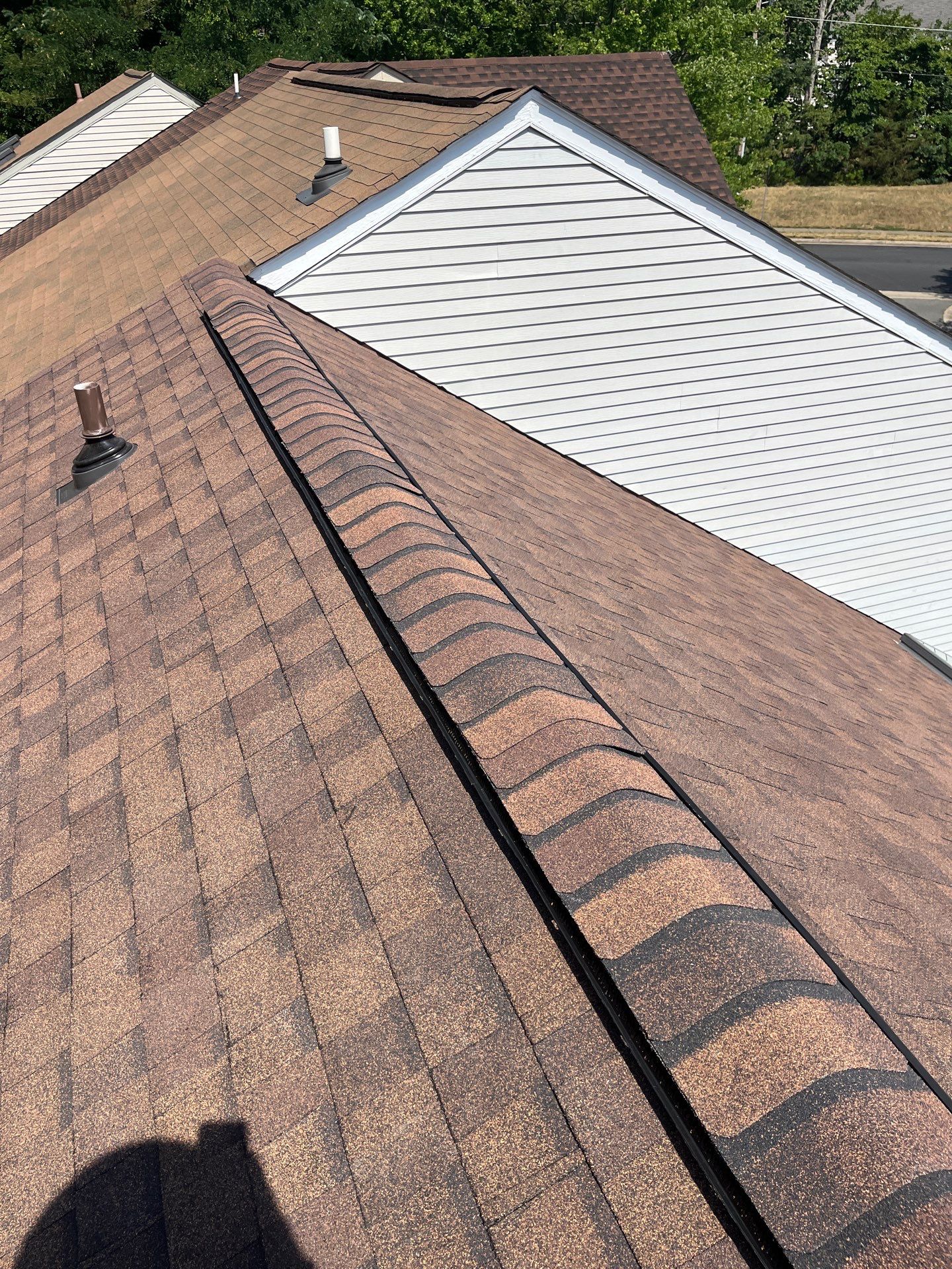 Montclair: Roof Installation with CertainTeed Landmark Designer Shingles in Burnt Sienna by RM Banning, Inc.