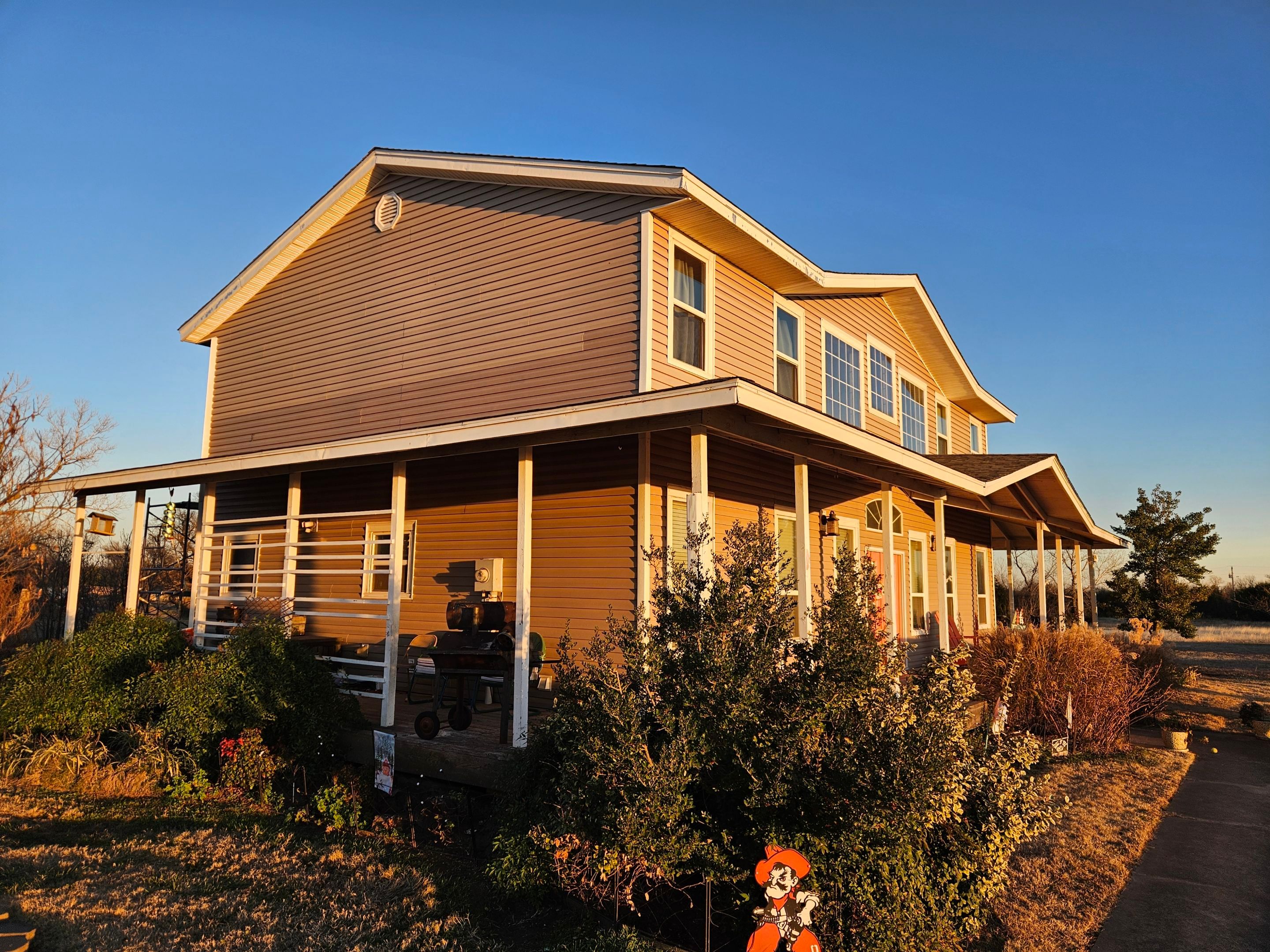 Roof Siding & Window Project in Mustang, OK by Z Construction & Roofing, LLC