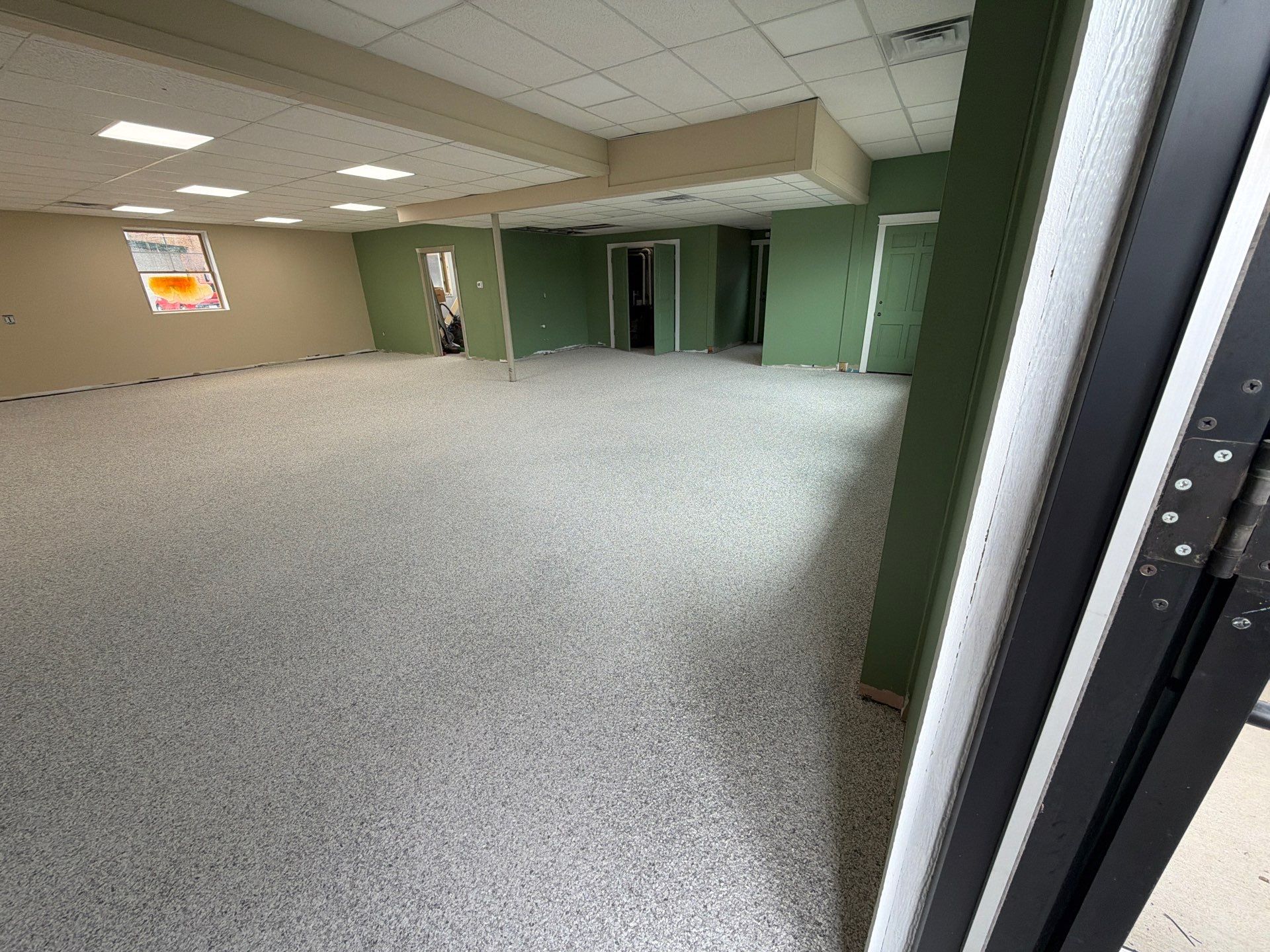 Commercial Epoxy Flake Floor Installation and Concrete Refinishing in Montague by Gordon Painting