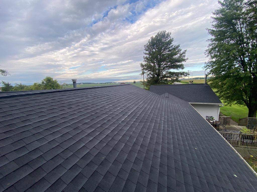Storm damage roof replacement by Nitro Roofing and Construction
