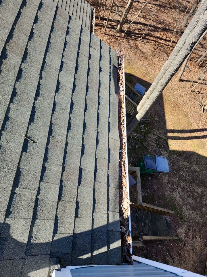 Gutter Cleaning using water by Power Wash Masters LLC