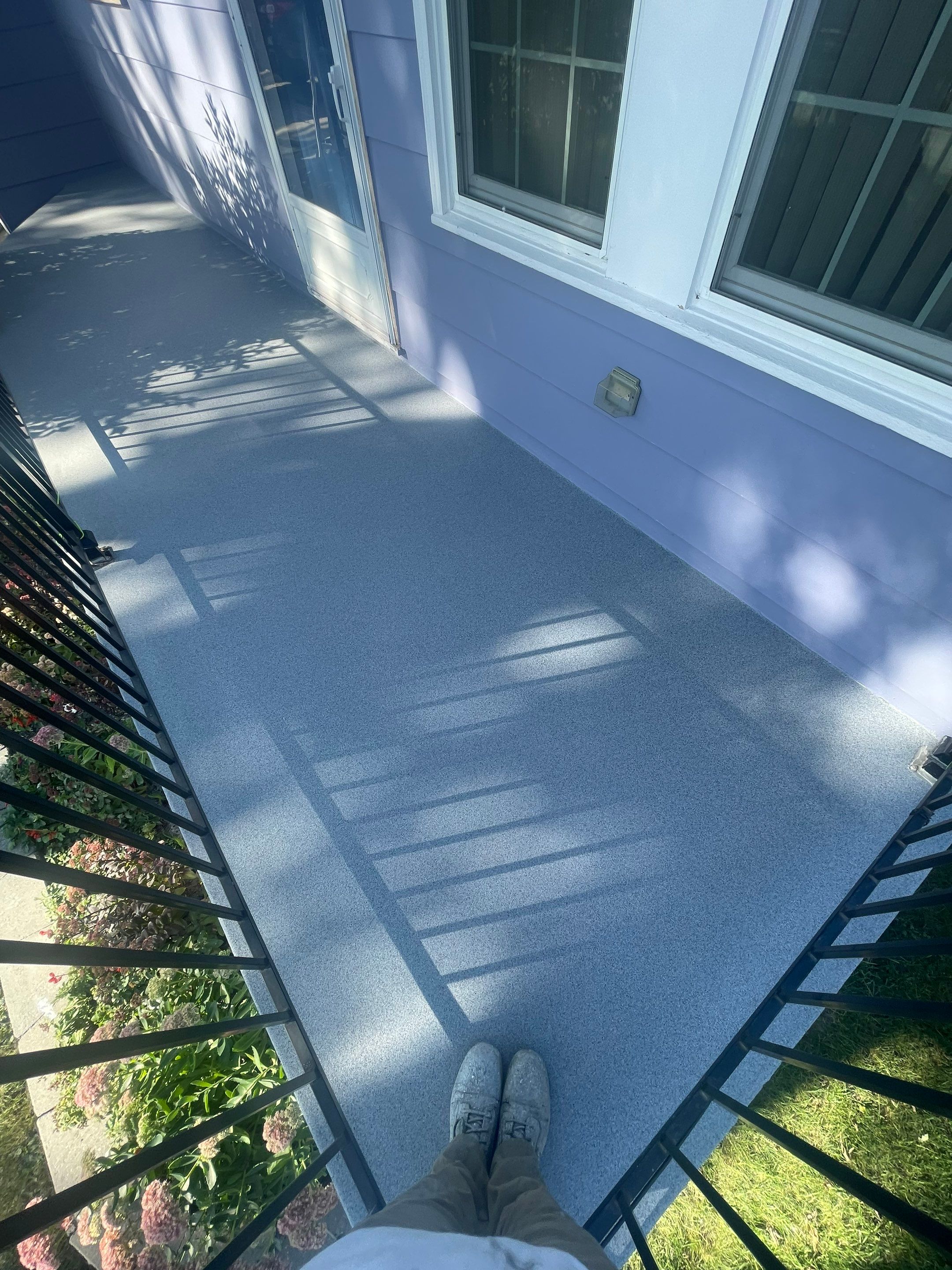 Sioux Falls Concrete Porch Coating with Starry Evening Finish by Select Painting, Coatings & Garage Cabinets