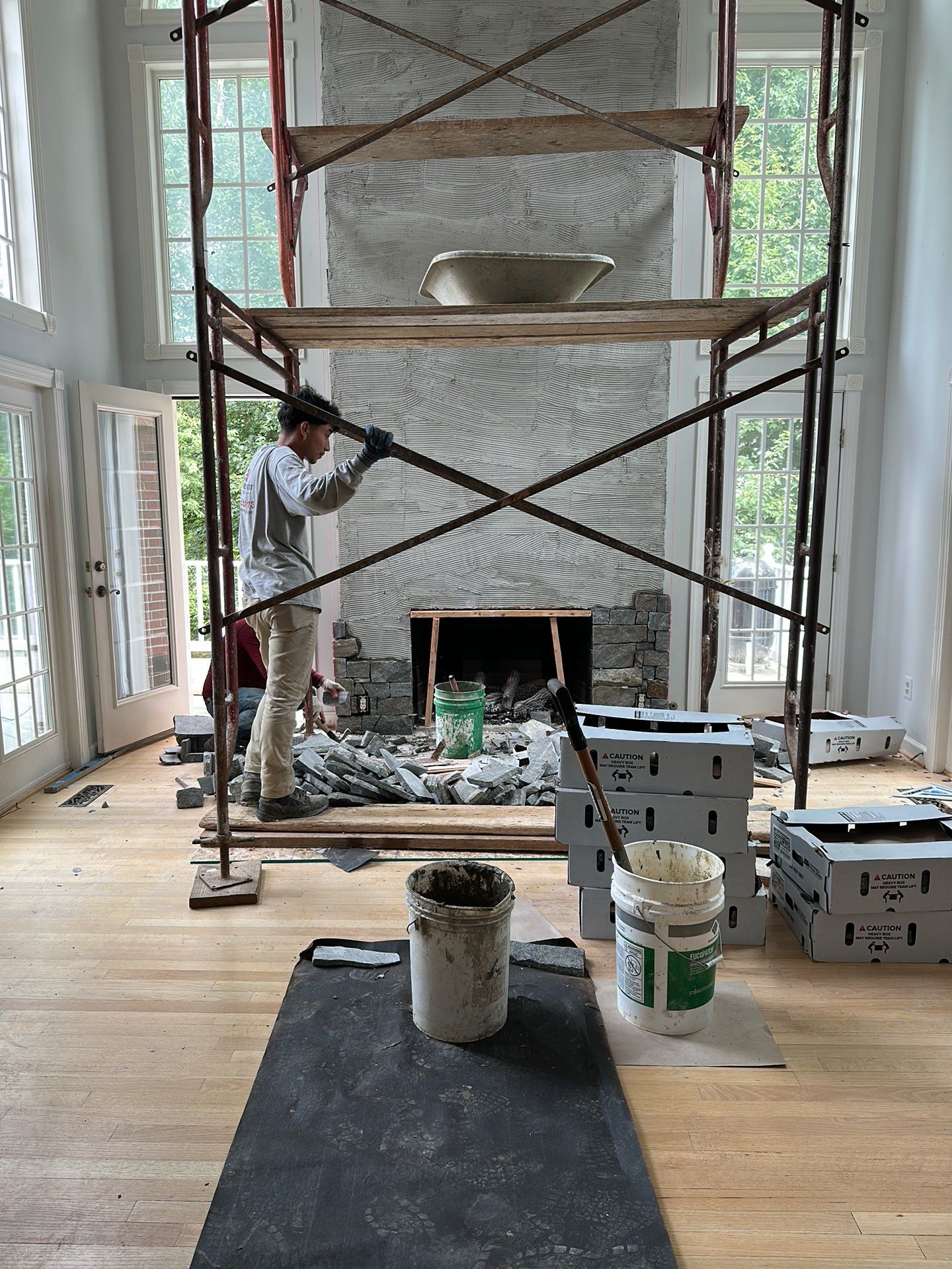 Fireplace remodel, Great Falls, VA by Fairfax Contractors, LLC