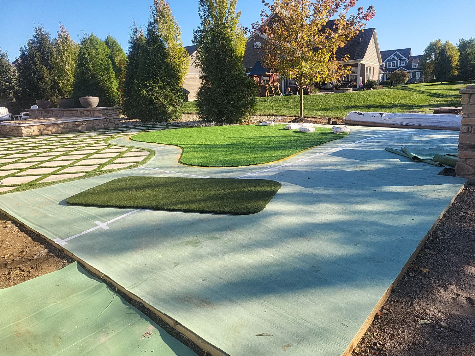 Residential Golf Green and Modern Paver Patio Installation in Centerville by Southwest Greens Midwest
