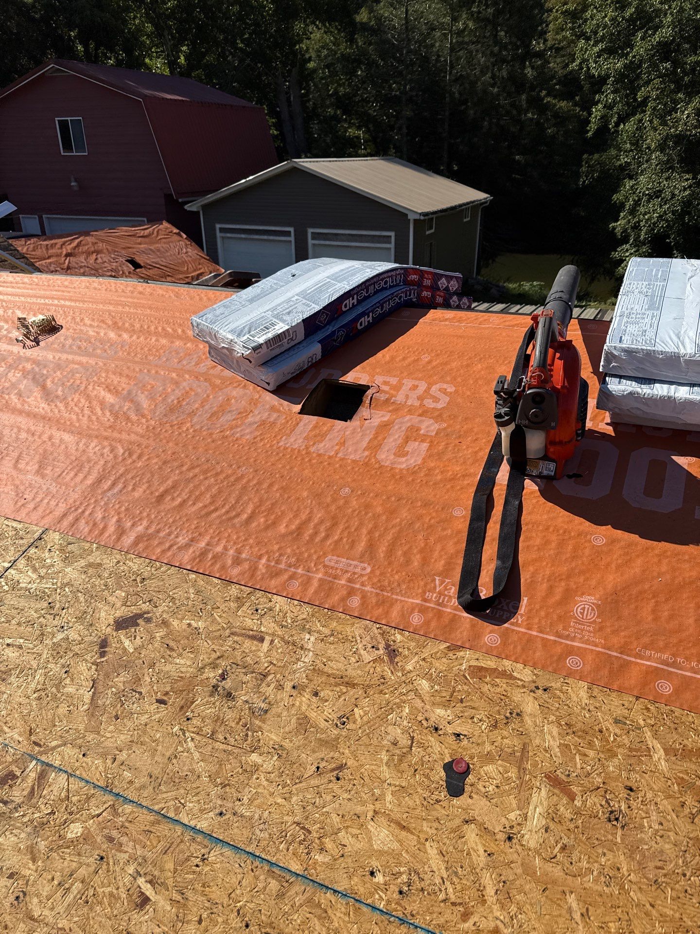 Residential Roofing Installation using GAF Timberline HDZ Charcoal by Rainstoppers Roofing