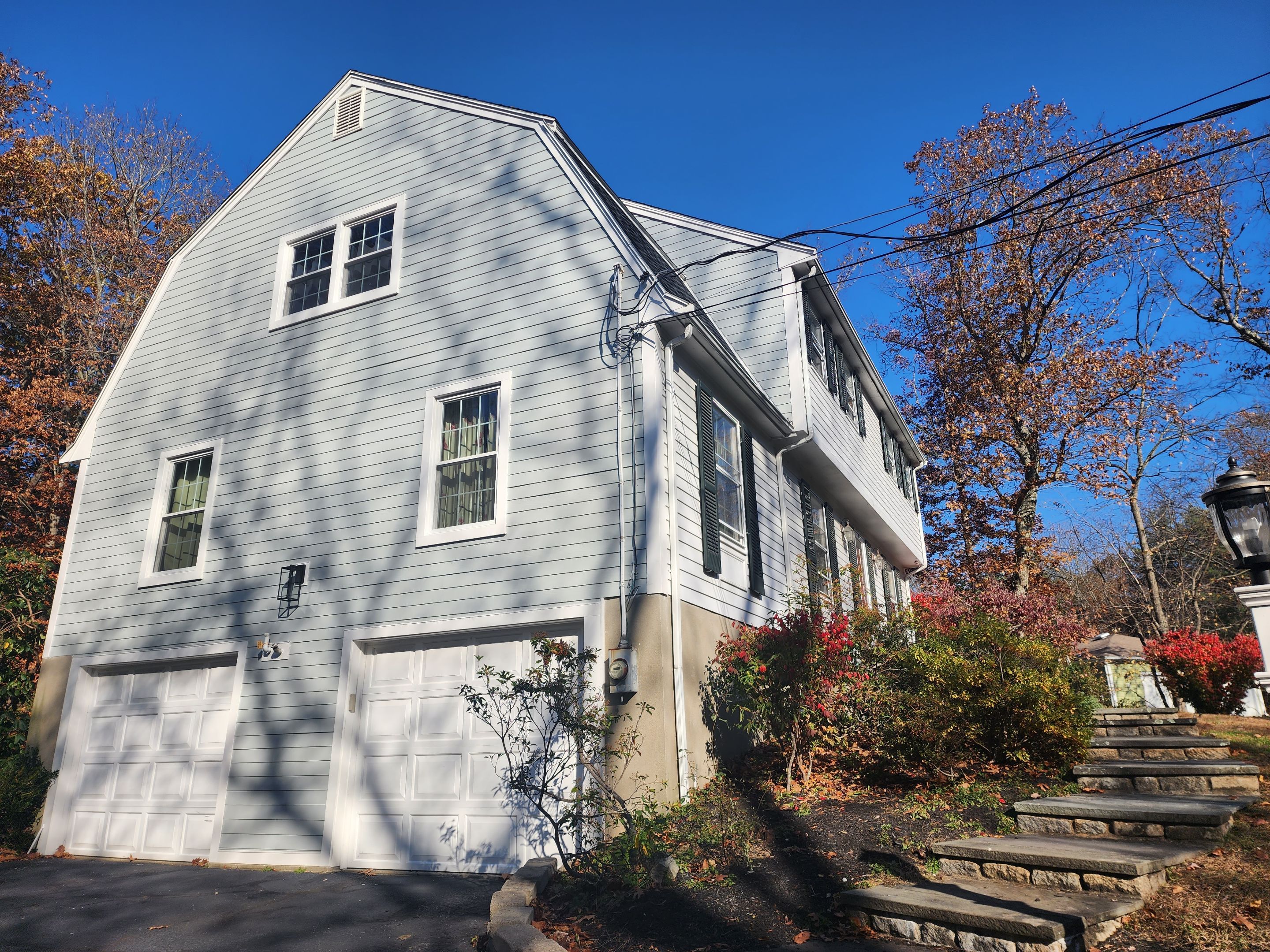 Custom window trim work and siding replacement in Dover, MA by UBrothers Construction