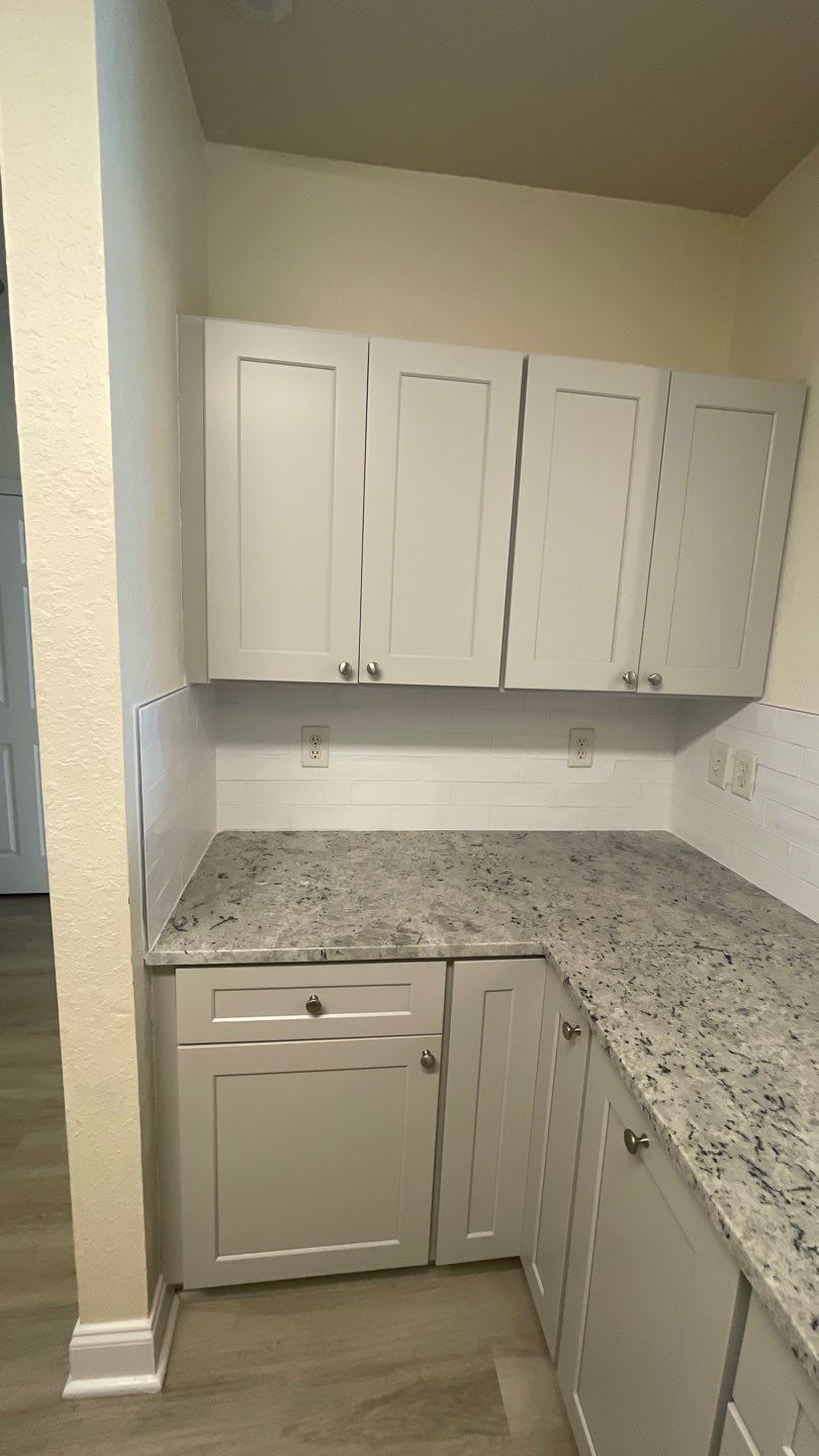 Home Remodel using LVP Flooring and Cabinets by HandyMangum