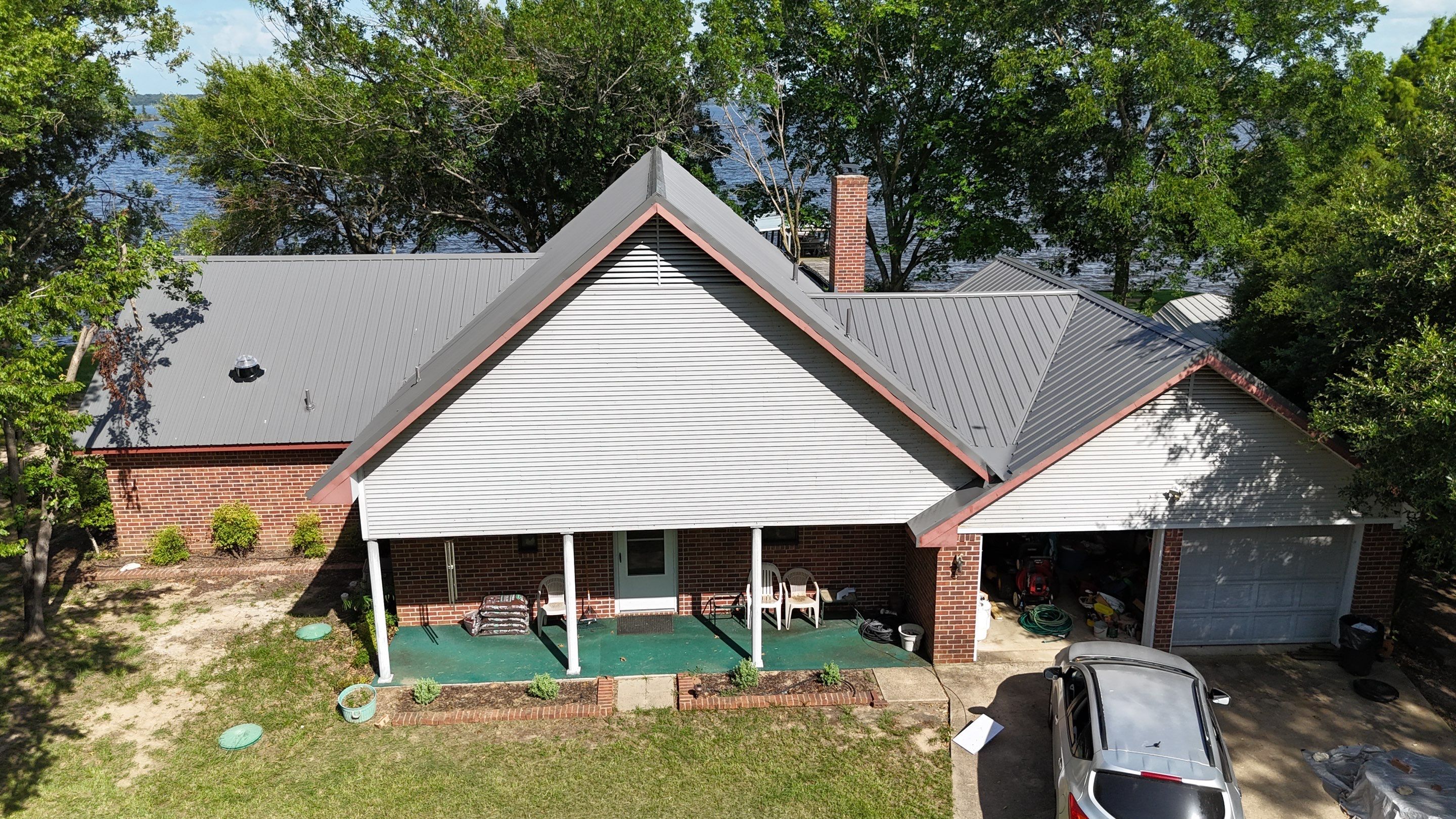 Charcoal Metal Roof at Lake Limestone, Tx by DT Roofing - Seth Wells