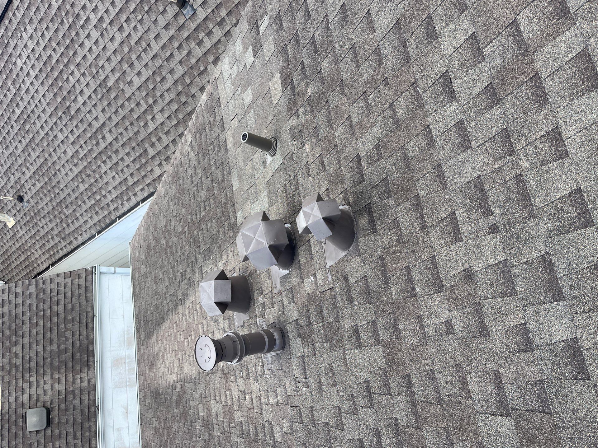 Hail Damage using Owen's Corning Duration (Lifetime) Shingles by Roof Repair Company