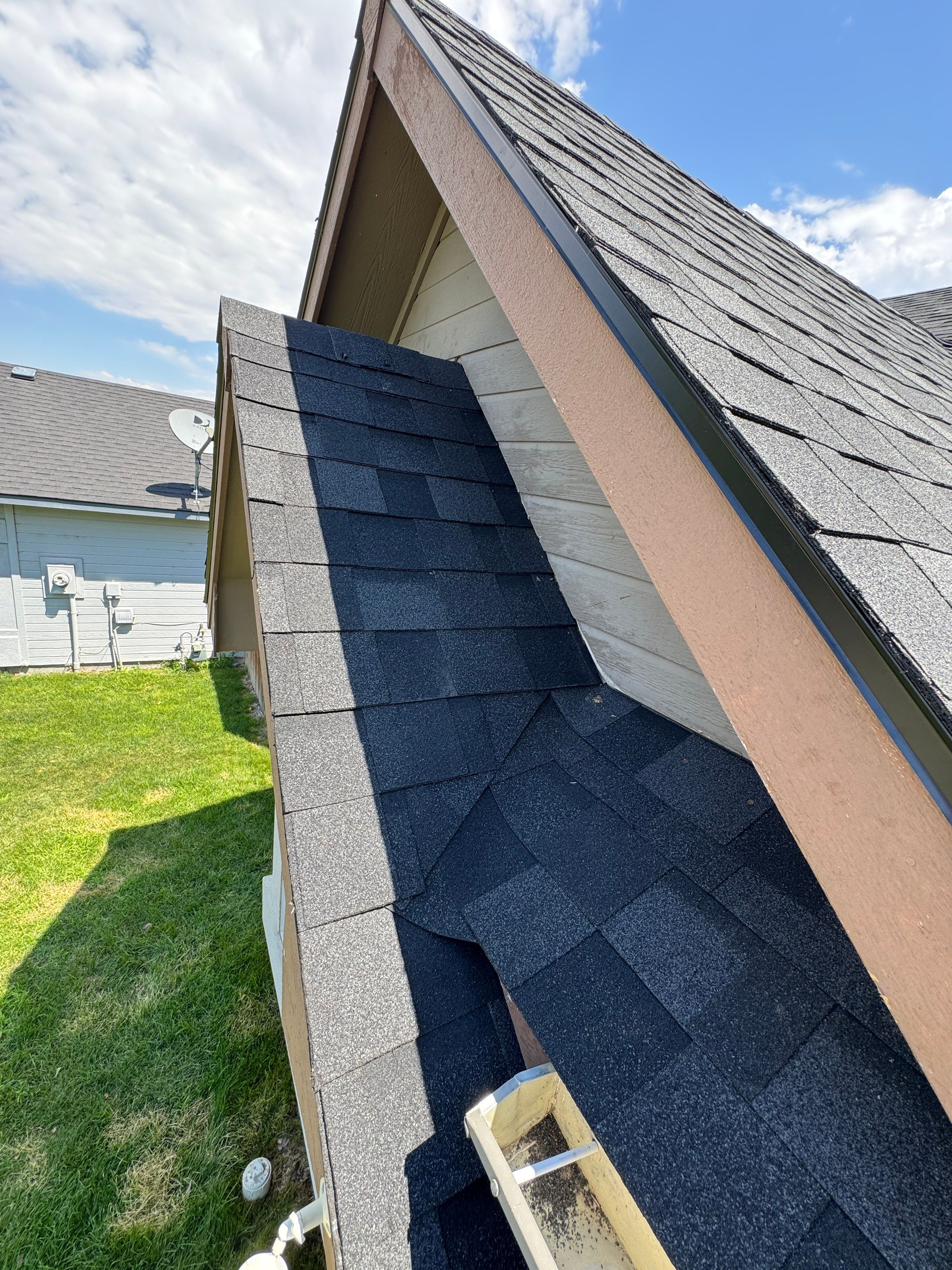 Residential Roof Replacement Featuring Charcoal Grey Architectural Shingles by Olive Roofing