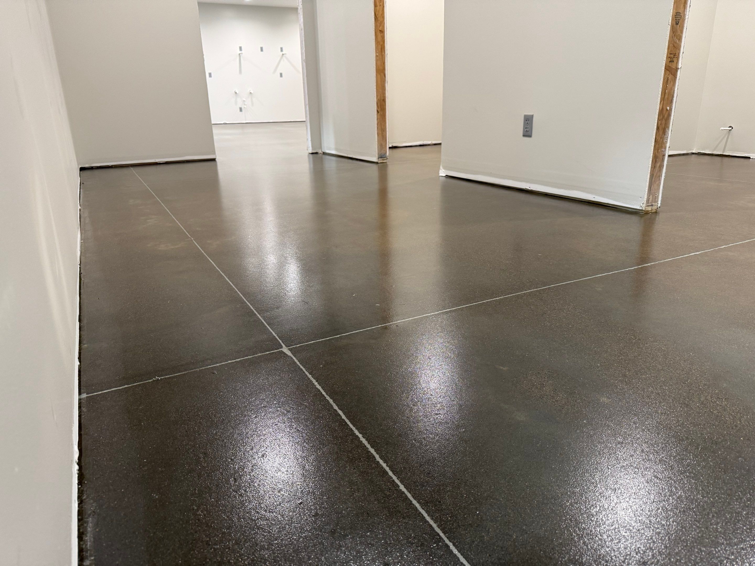 Industrial Concrete Polishing and Coating for Large Manufacturing Warehouse by Select Painting, Coatings & Garage Cabinets