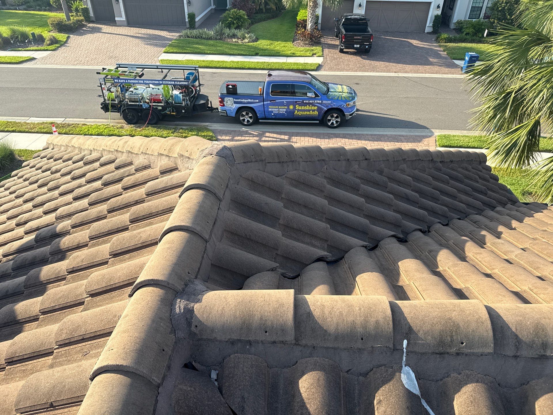 Soft Wash Roof Cleaning – Concrete Tile Roof | Artisan Lakes Esplanade, Palmetto, FL by Sunshine AquaWash