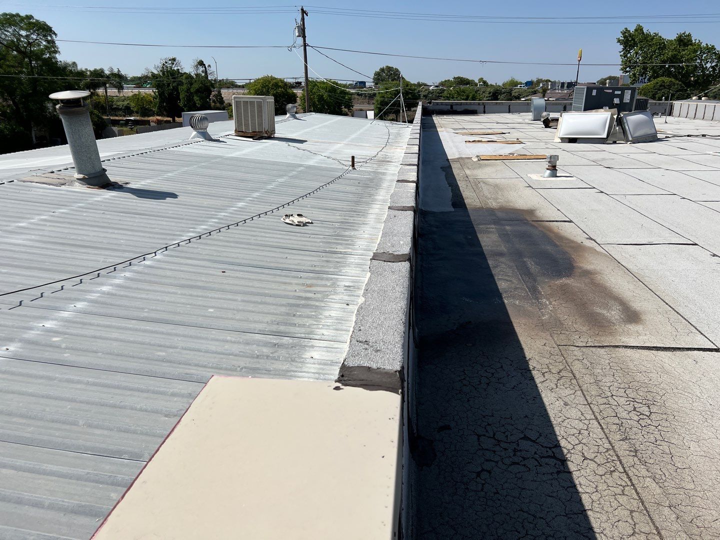 Spray foam and coatings using Conklin Benchmark/PUMA XL coatings and spray foam by Straight Edge Roofing Inc