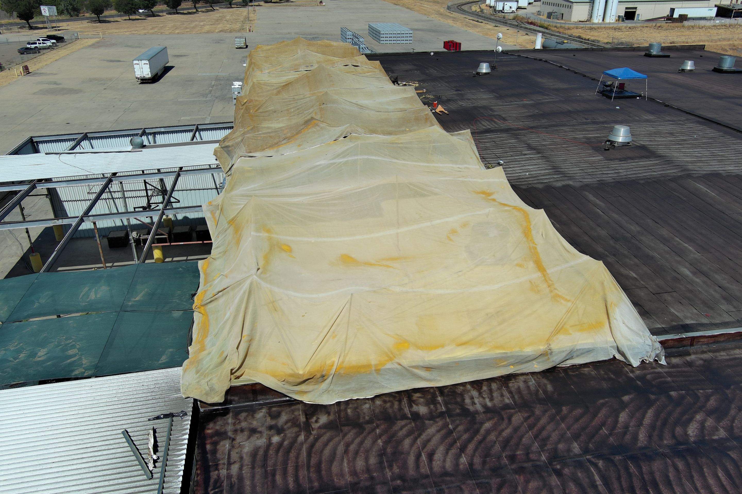 Pro Farms Spray foam roofing project by Straight Edge Roofing Inc