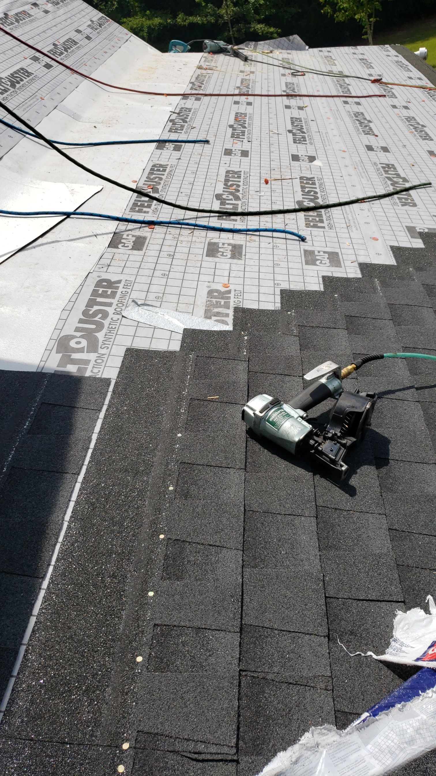 Residential Roofing Installation using Roof Replacement by American Roofing & Construction LLC