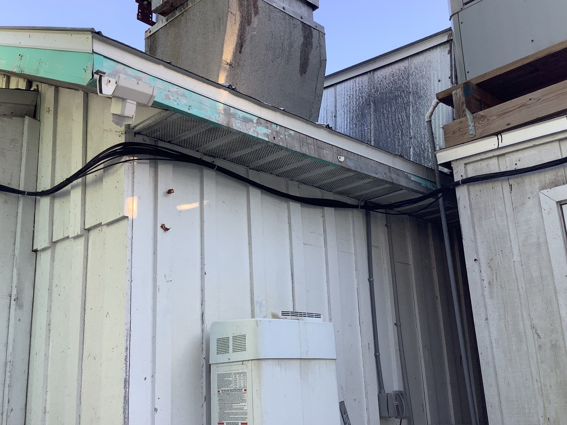 Commercial Downspout Installation in Captiva FL by Gutter Professors