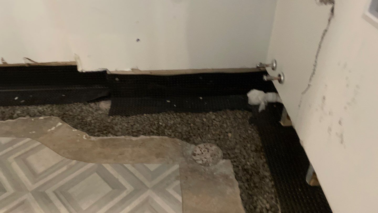 Interior Drain Tile & Buried Discharge in St. Anthony, MN by Waterproofing Northeast