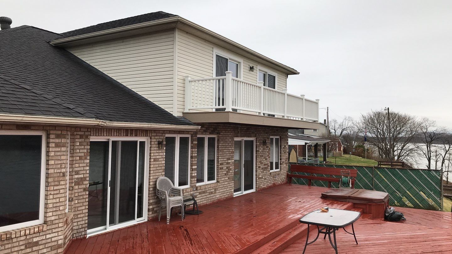 Deck Refurbush and Door Replacement using Trex Decking and Railing. Polaris Patio Doors by Secure Construction Company Inc